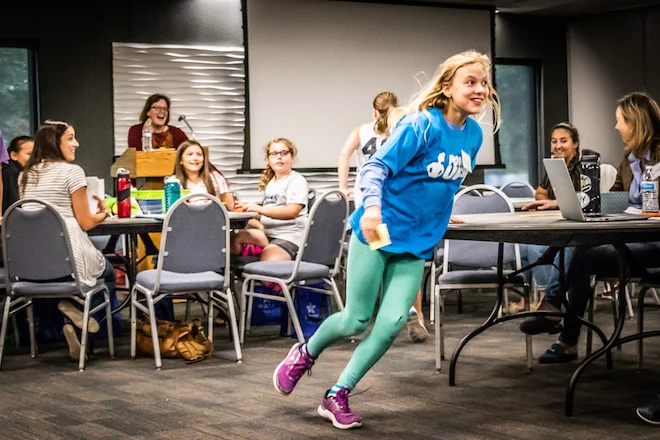 Greeley 6th-grader winning her team’s post-it note relay race at PowerUp!