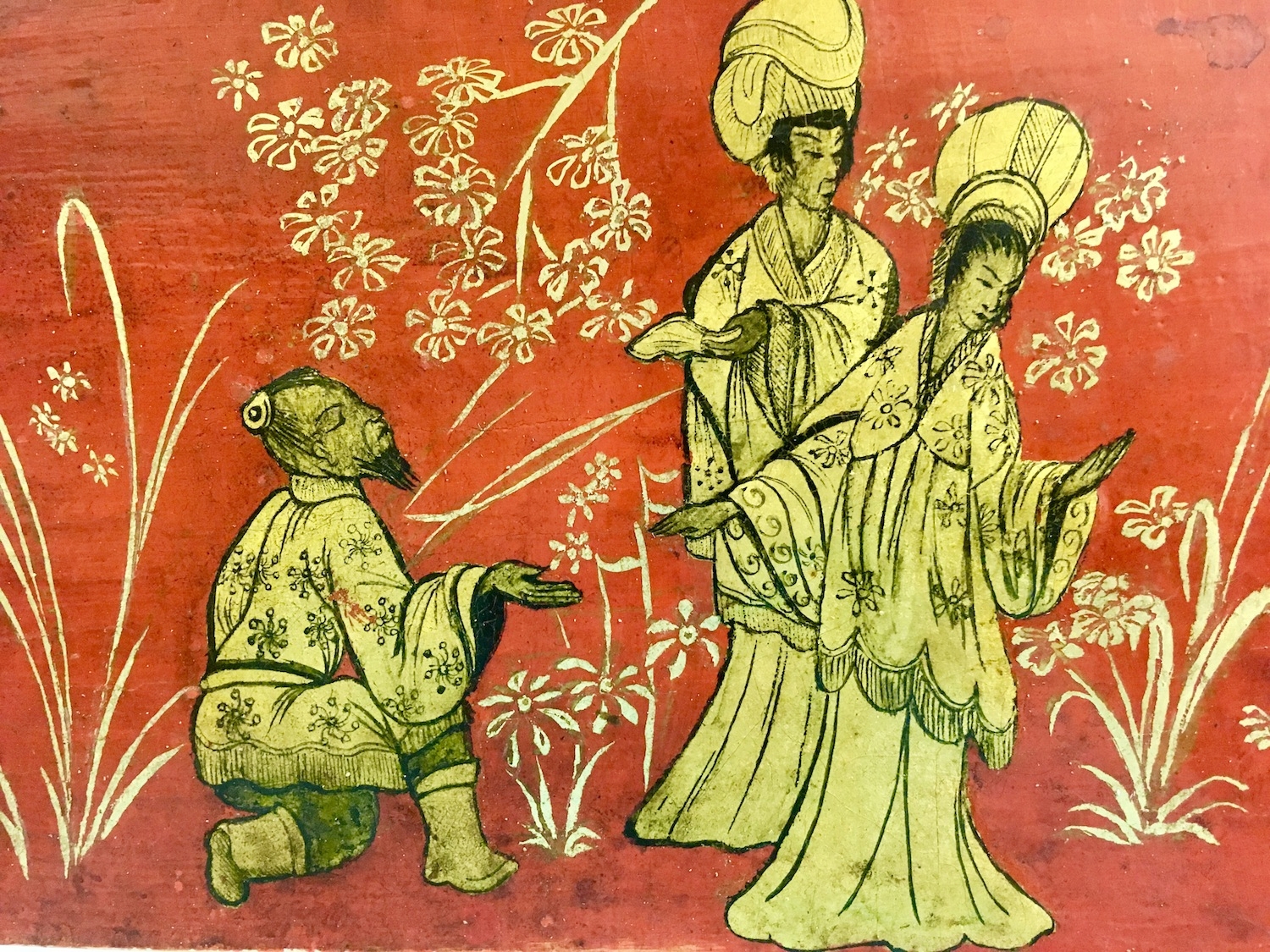   For this Chinoiserie scene the figures were first modeled using a technique known as pastiglia, where rabbit glue gesso is layered to make a raised form of the subjects.&nbsp; The red background I made with blonde shellac and genuine cinnabar over 