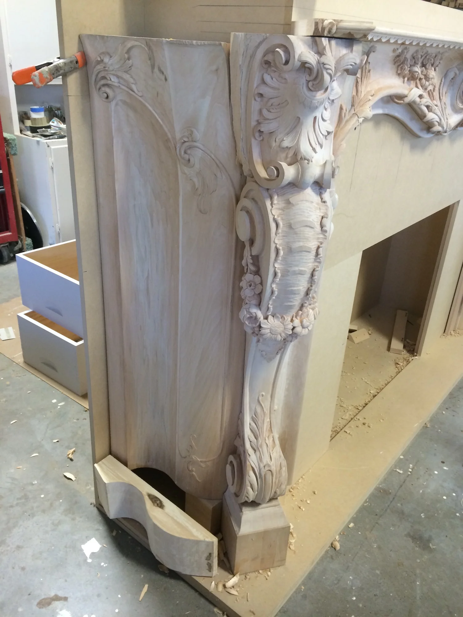 Here a full size mock-up of the fireplace and wall ensures that the mantel will fit and the installation will be successful. Being for an older home, even the slight slope of the floor is built into this mock-up.
