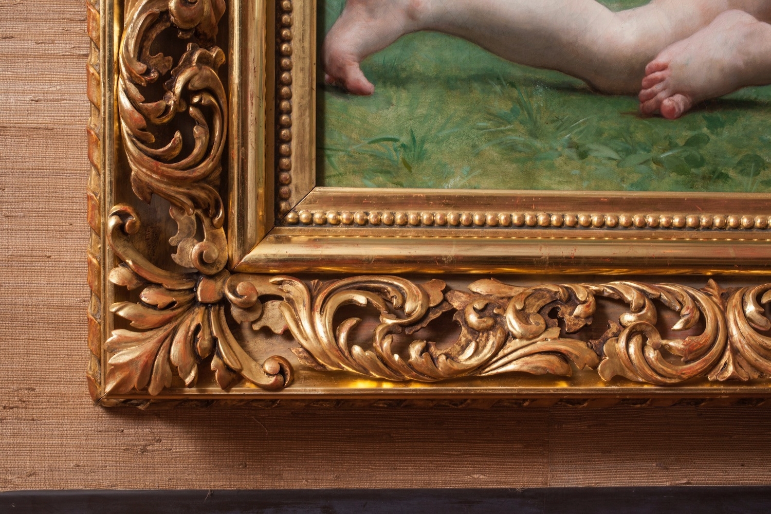 A corner detail of the acanthus frame.