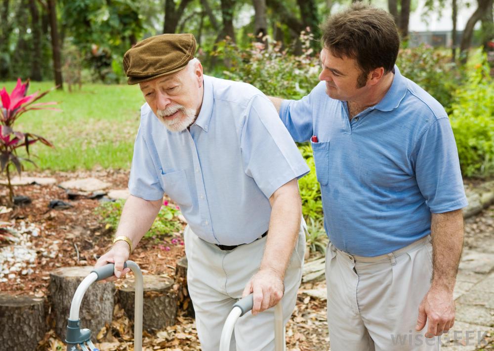 man-in-blue-shirt-with-old-man-and-walker.jpg