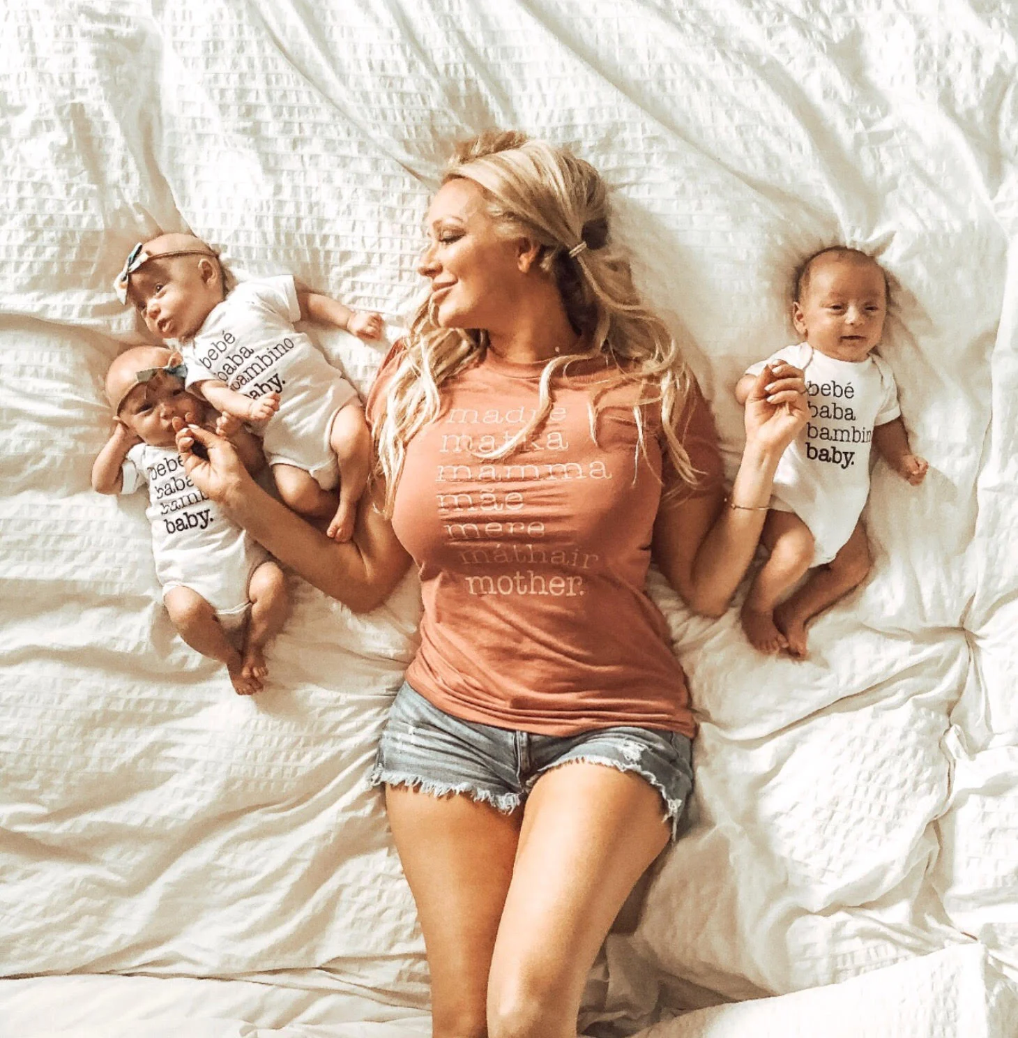 christy and triplets in white.jpg