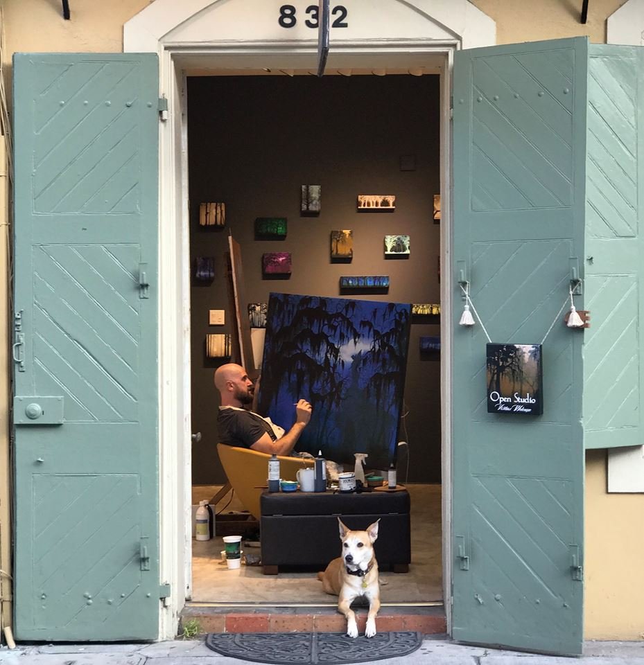 Tanner painting through doorway with loretta.jpg