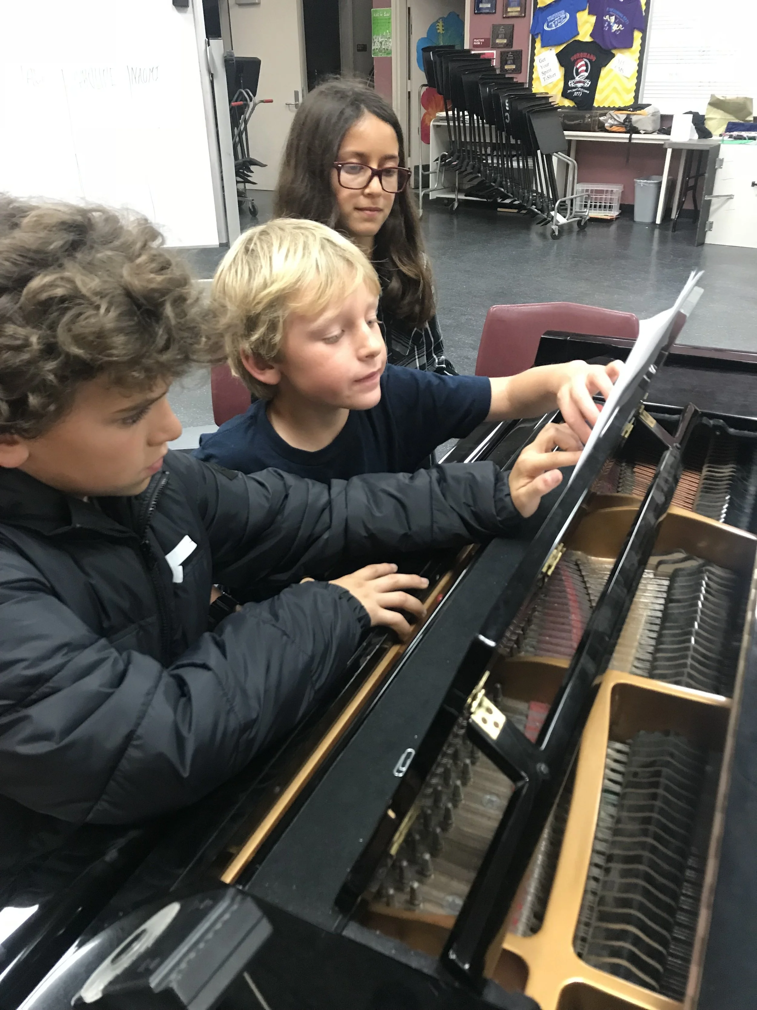 Examining a score together at a Music Workshop