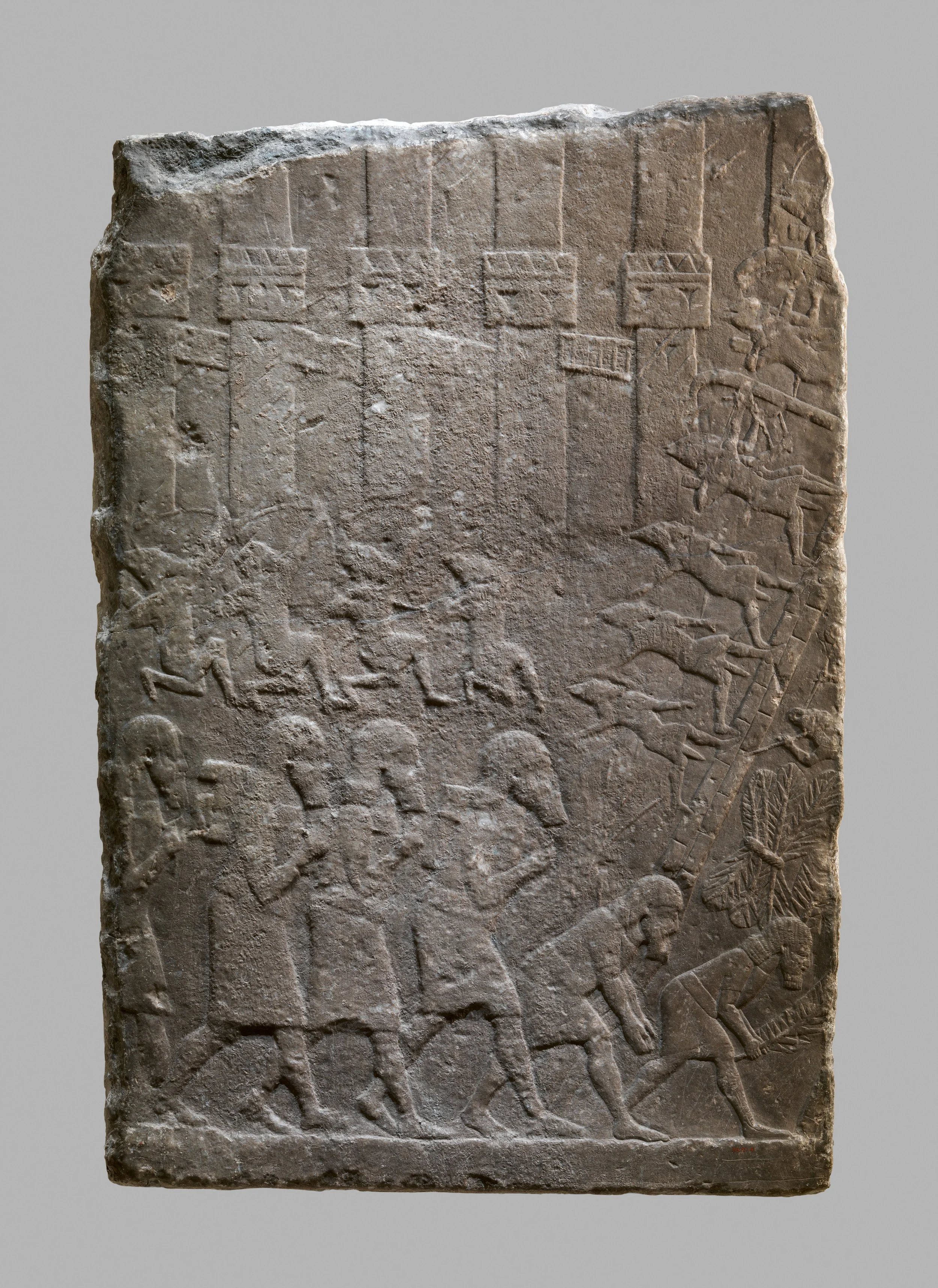 Assyrian Relief showing archers, a siege rampart.