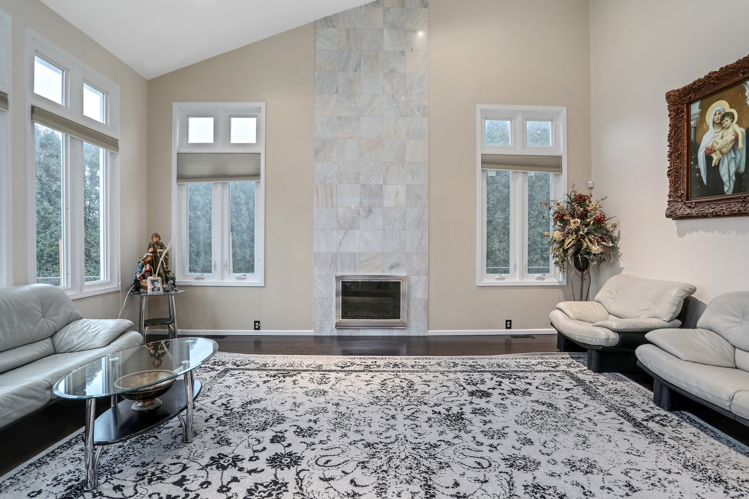  Sterling Heights Real Estate Photography - modern living room with soaring fireplace 