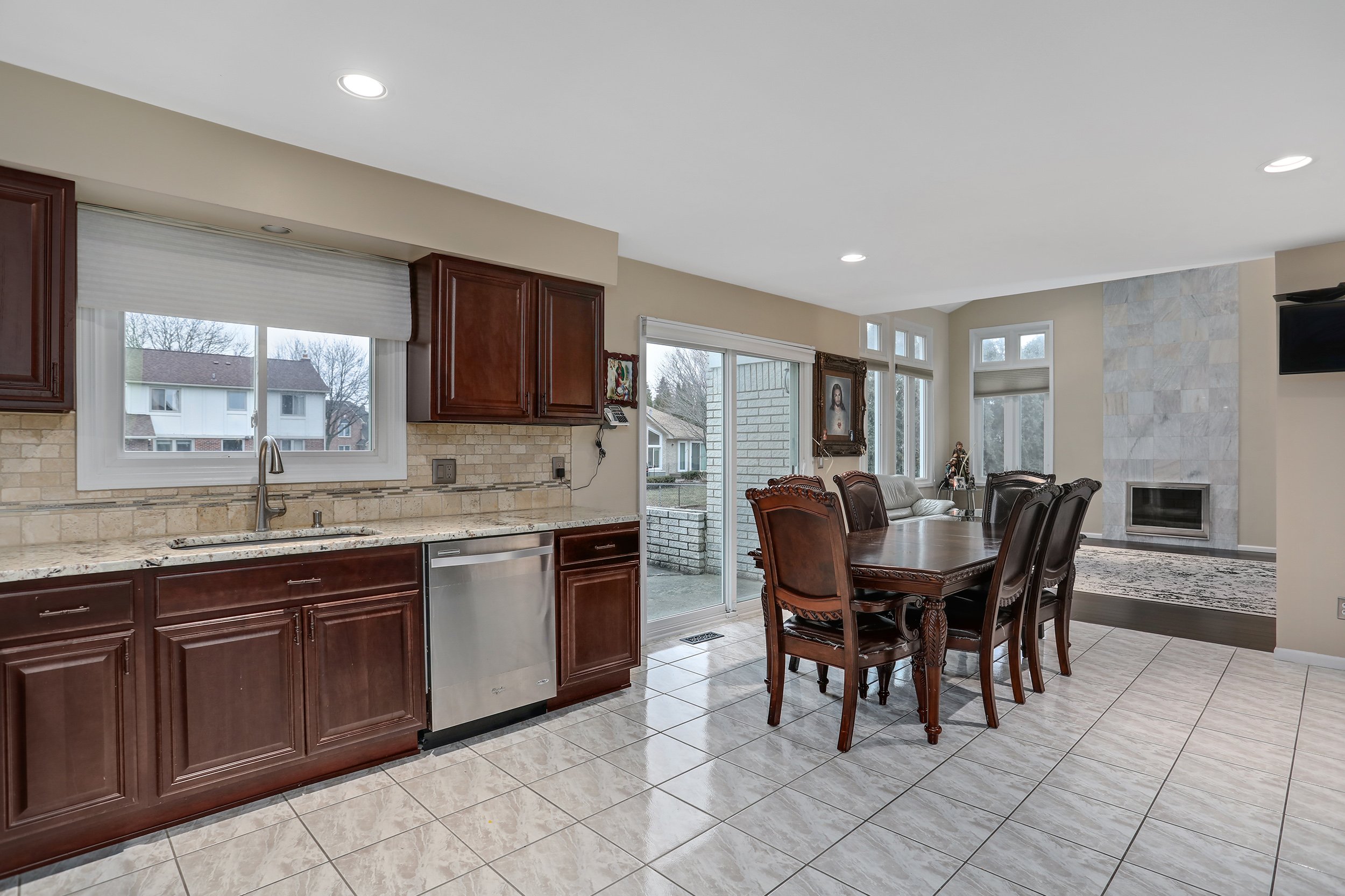  Sterling Heights Real Estate Photography - open kitchen dining room area 