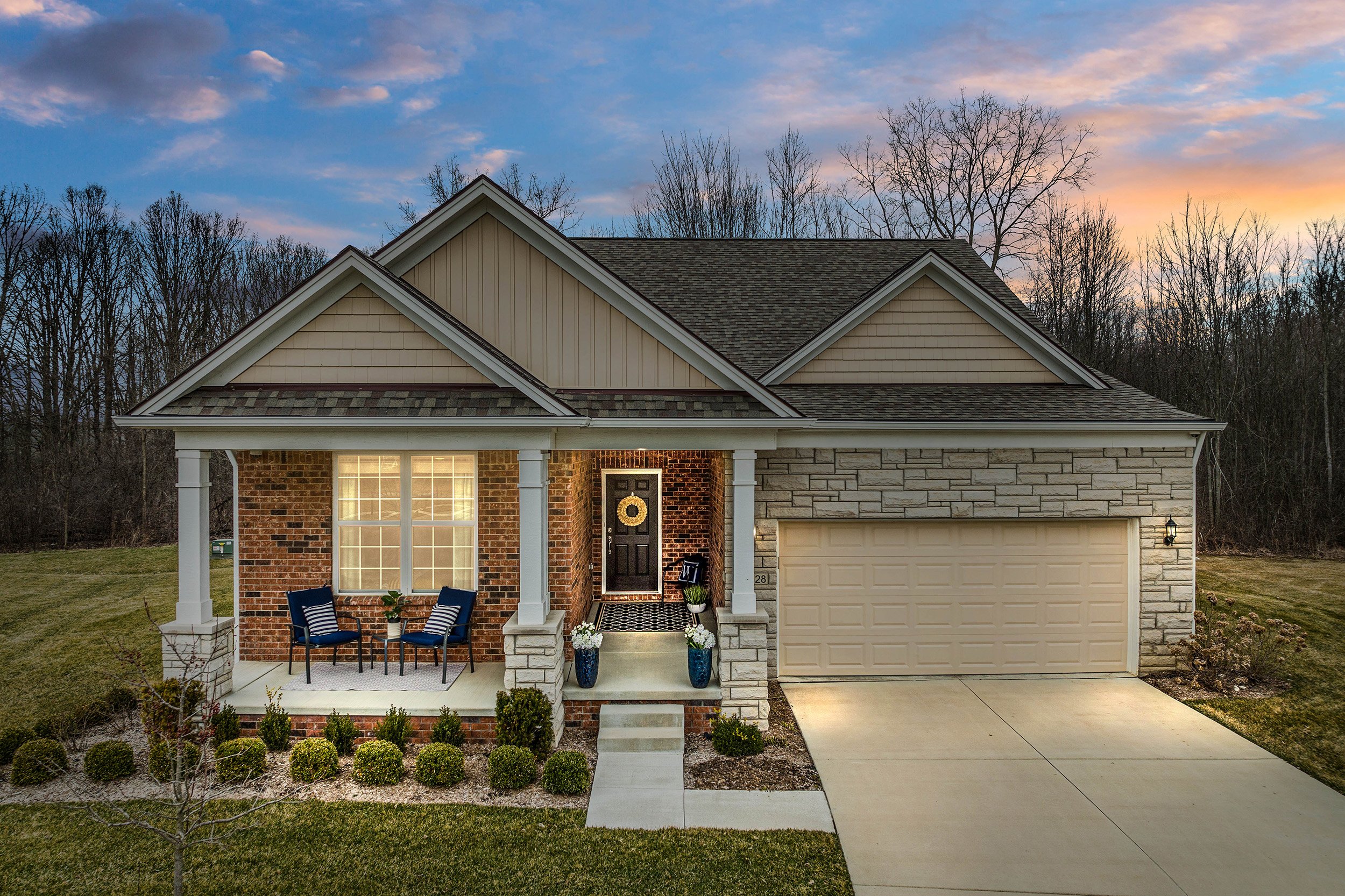  Canton Real Estate Photography - twilight exterior of cute bungalow with curb appeal 