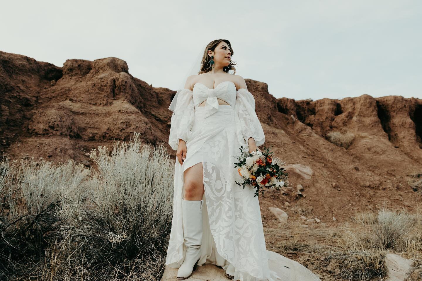 Looking like a babe in boots on her wedding day!