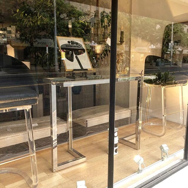 Decorum window with a mix of new and vintage pieces! 
#vintage #furniture #console #barstools #acrylicfurniture #art #blackandwhite #gold #murano #newandold #shopwindow #toronto.