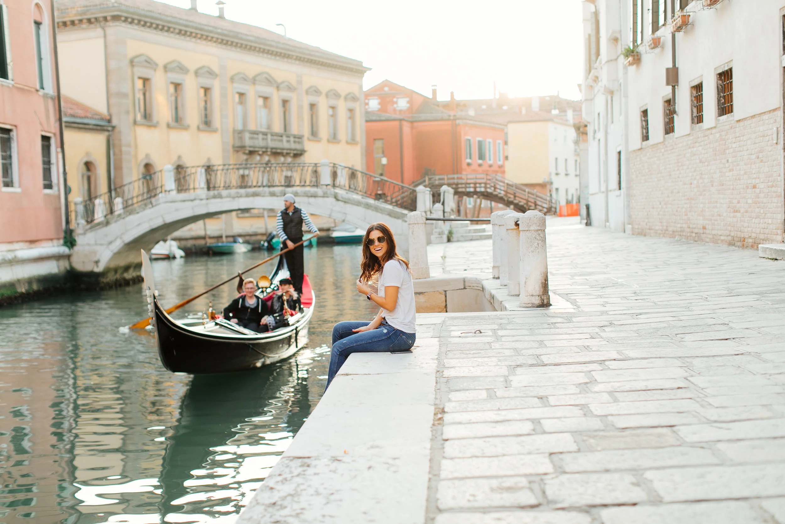 Funny story about this image: I had been trying all day to get an epic gondola picture, and it just wasn’t happening. The sun was giving us heavenly golden-hour rays, so I had given up on the gondola for the moment, and was having my husband, Brandon, take some shots for the blog/social. Sure enough, the most romantic, golden hour gondola ride comes floating by, and by the time I realized what was happening, it was around the corner. SO, my epic gondola shot opportunity has my goofy self plastered right in the middle. sigh