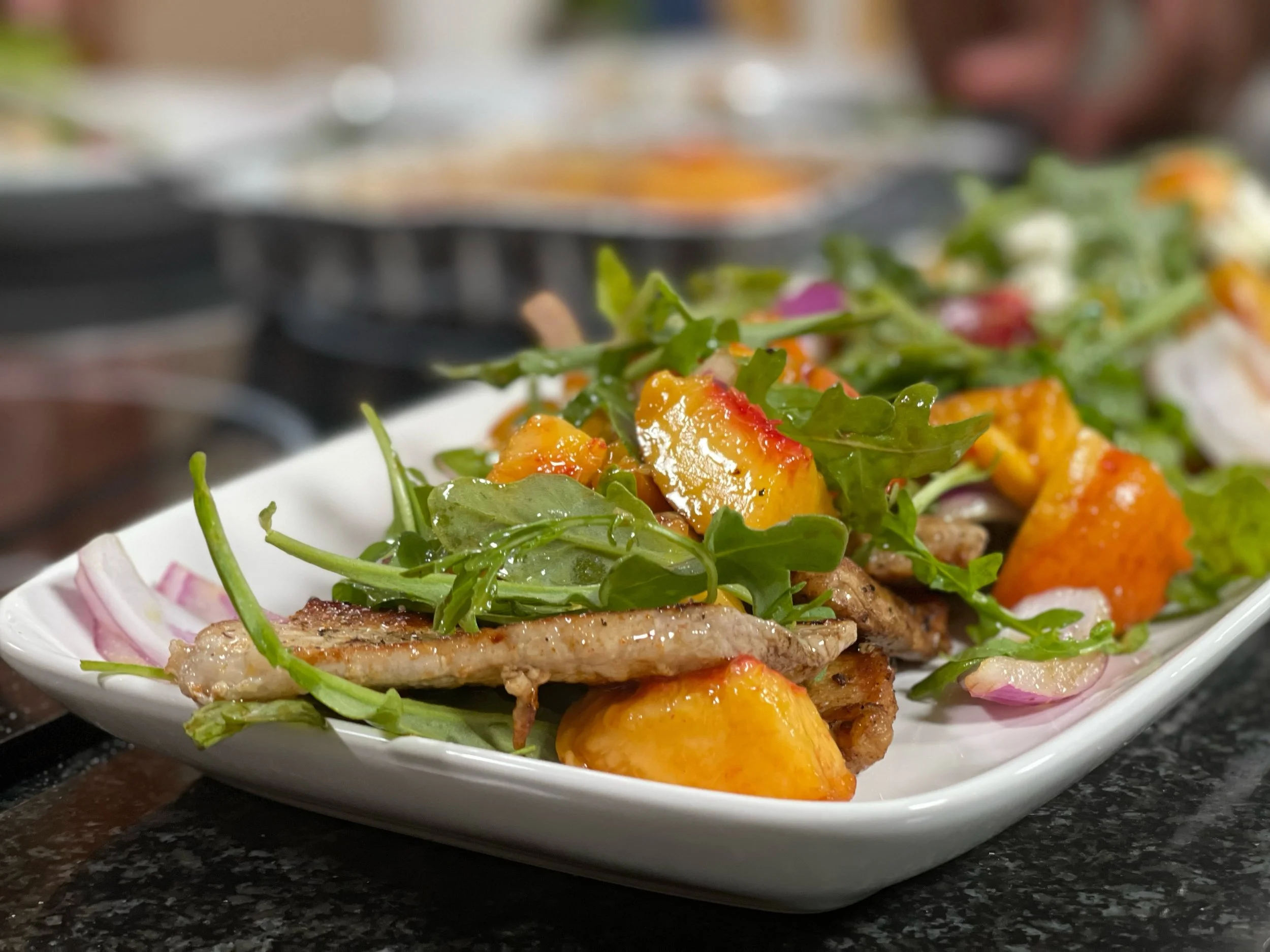 Recipe: Seared Pork Cutlets & Summer Peach, Onion & Arugula Salad