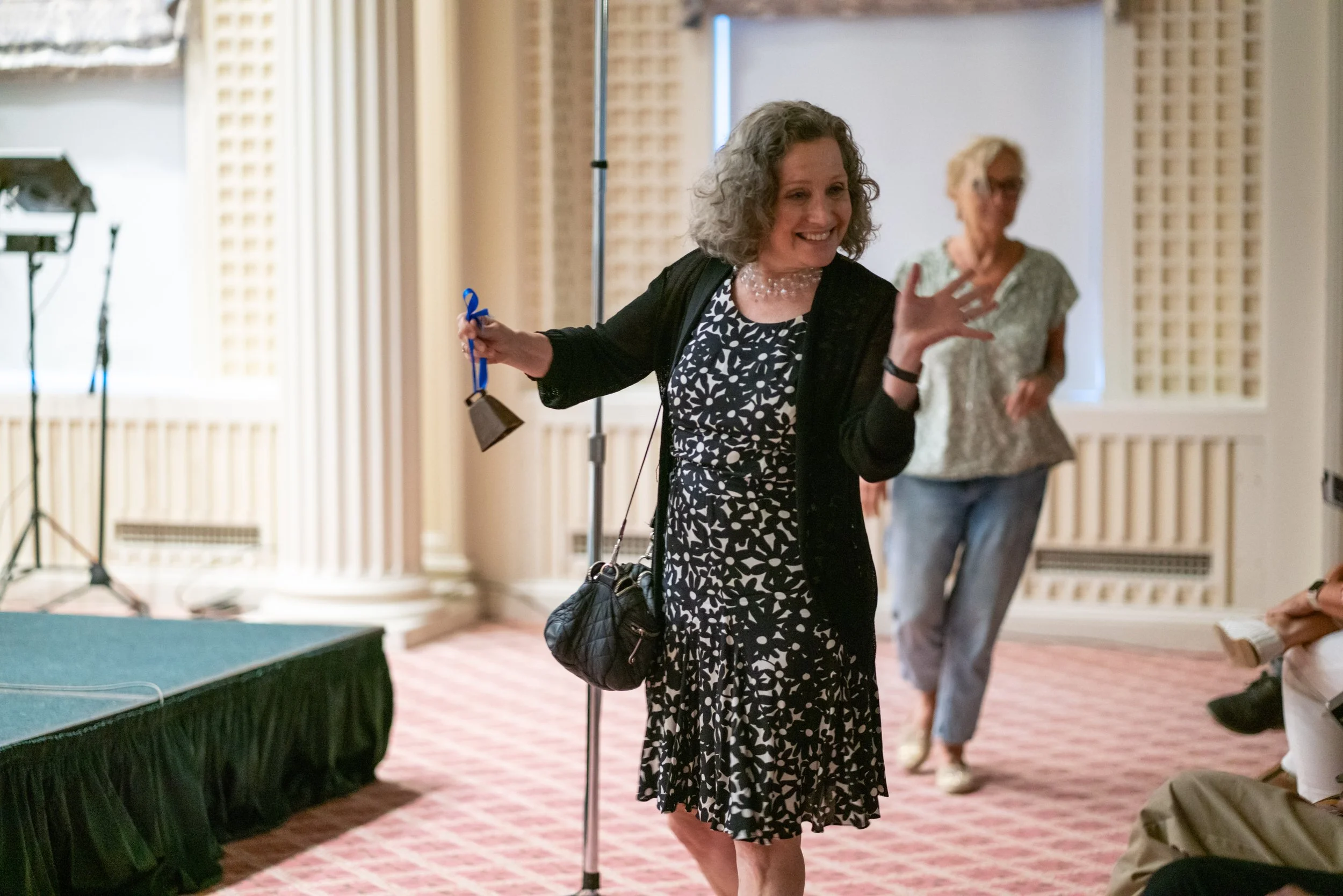 Linda rings the bell.JPG