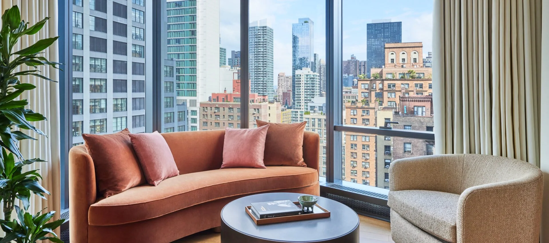 Pendry-Manhattan-West_Skyline-Corner-One-Bedroom-Suite_Sitting-Area-1920x850.jpeg