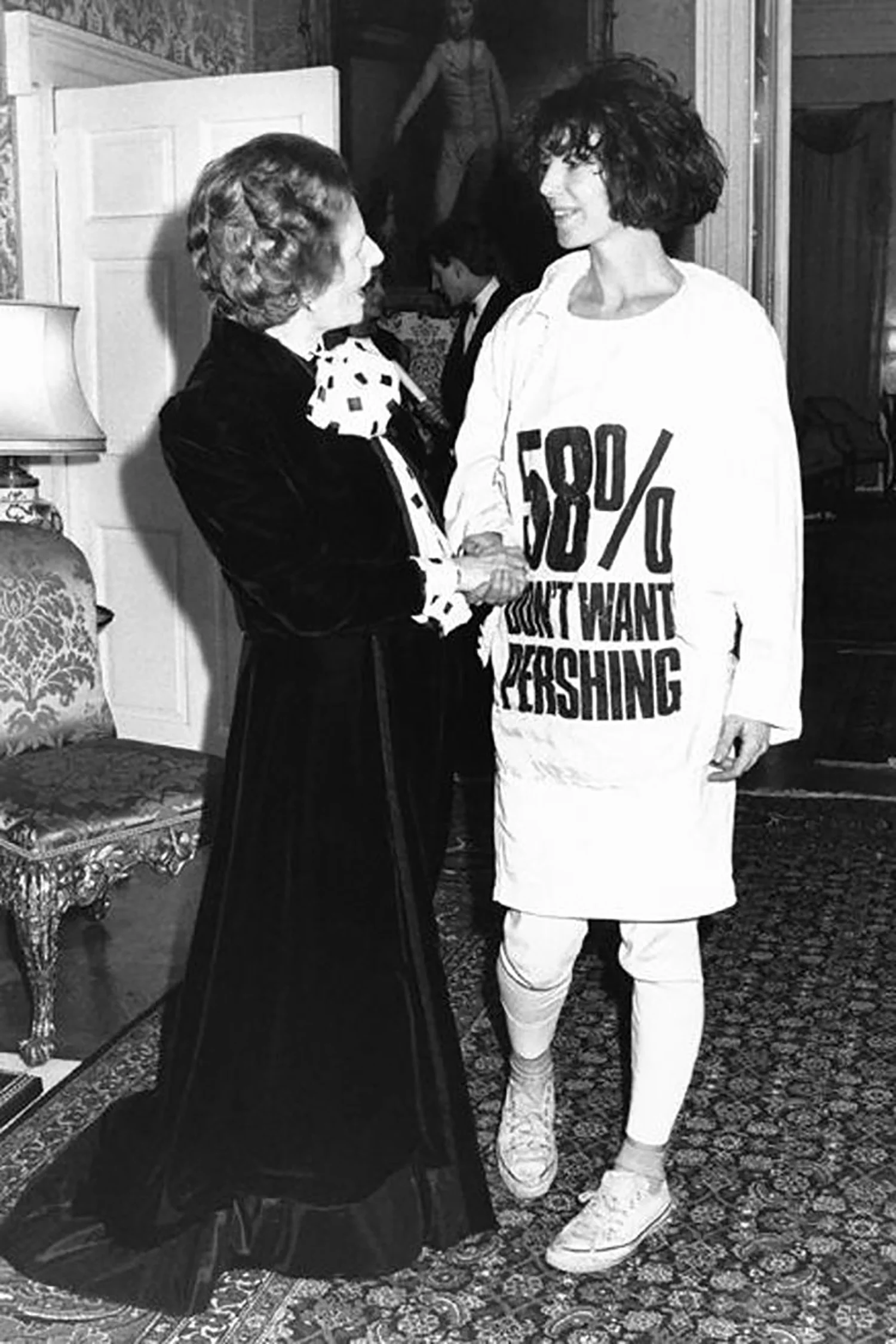 margaret thatcher + katharine hamnett, 1984. photo via getty images