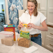 Decanting cereal into sealed containers