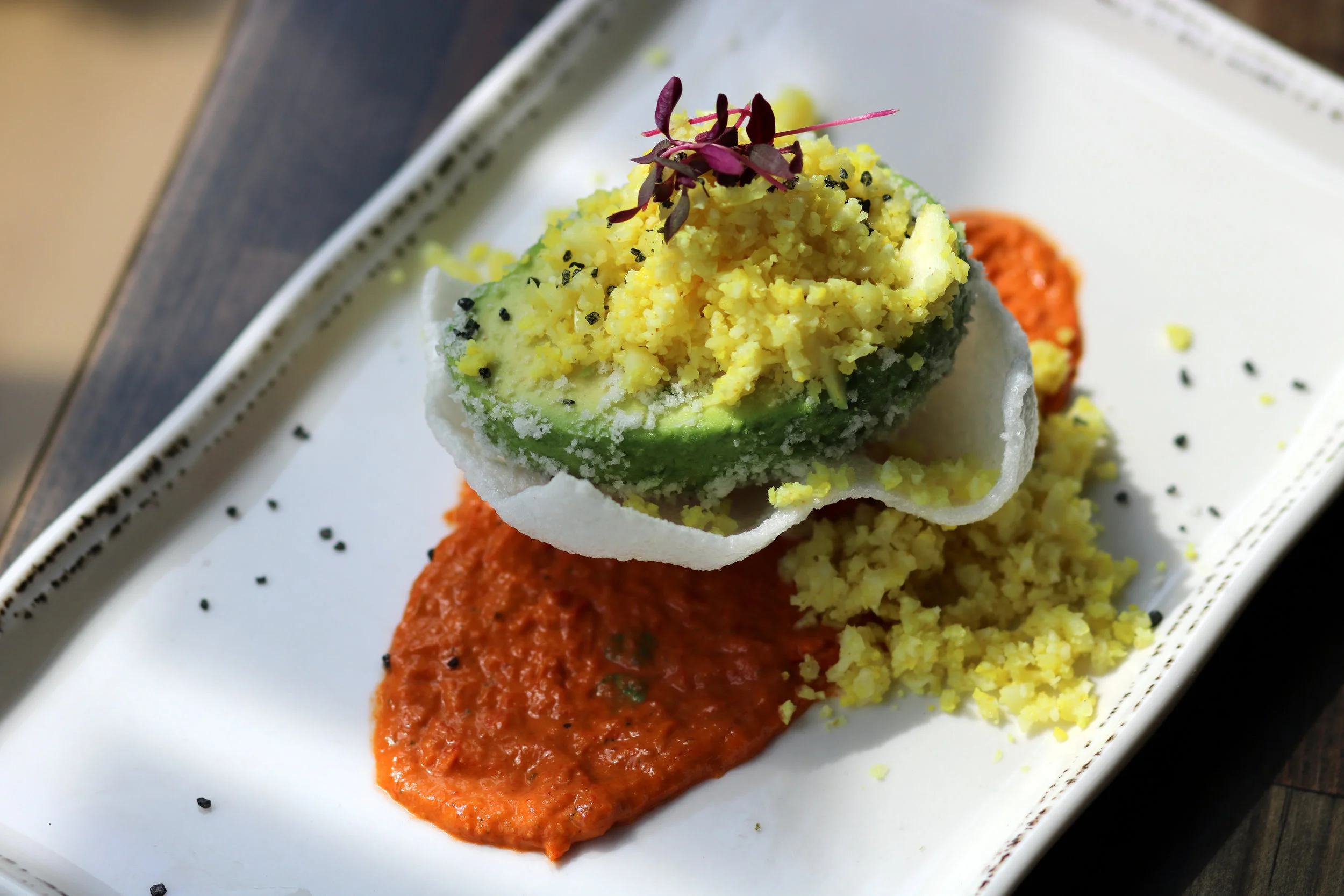 Stuffed Avocado with Pickled Cauliflower and Romesco
