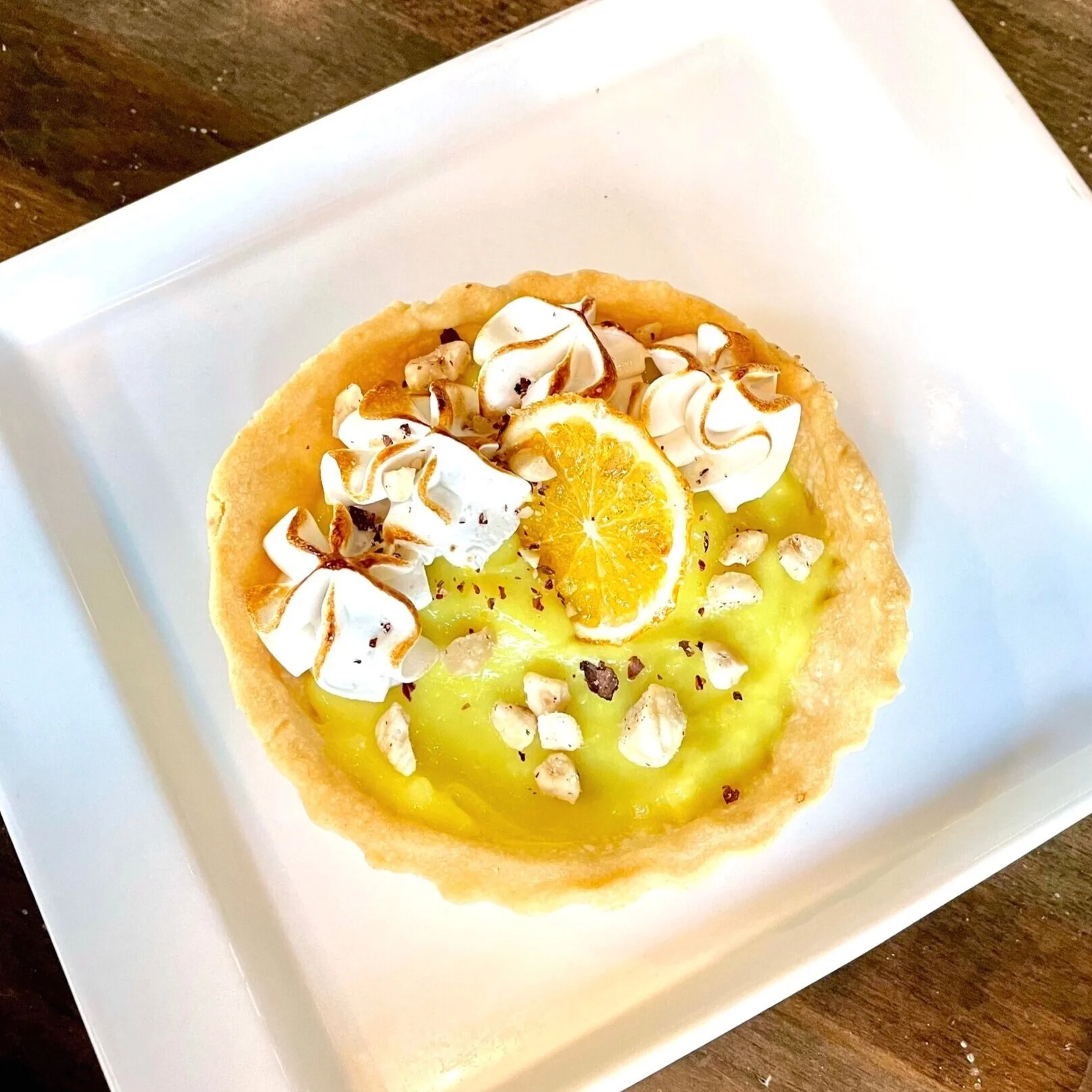 Featuring: Meyer Lemon Tart with chamomile marshmallow and toasted hazelnuts
