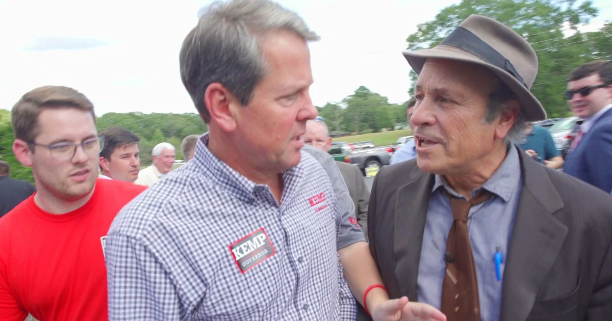 Elite Racists Have Abandoned Efforts to Propagandize 'the Appearance of Fairness in Elections' to Exclusively Promote the illusion of 'Participation in Democracy.’ Jim crow trickery is now just part of the deal, overwhelm the steal - fight harder for THE freedumb to choose your masters. In photo. GREG PALAST ASKS RACIST BRIAN KEMP ABOUT HIS CONFLICT OF INTEREST IN COUNTING HIS OWN VOTES & PURGING HIS OPPONENT’S VOTES.