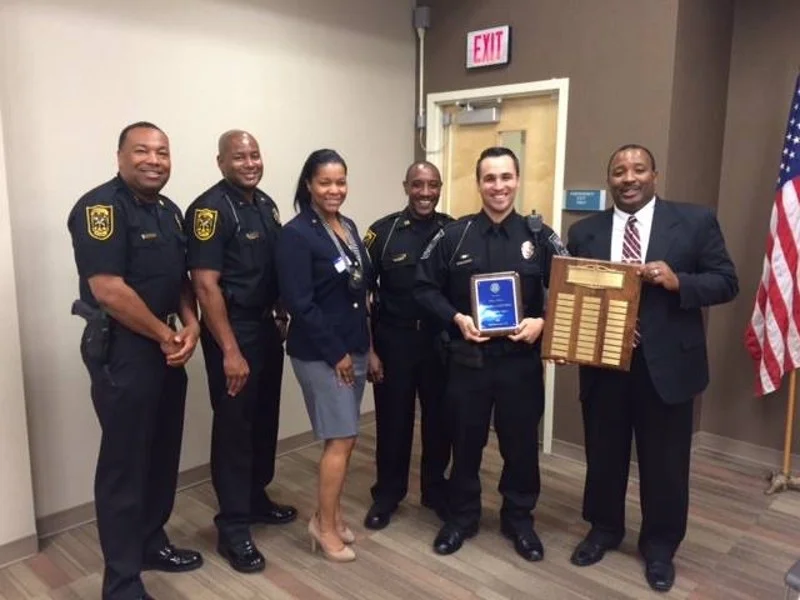 How Many Lies Did THIS White Cop Tell These Black Folks For Them to Stand & Smile with Him Like That?