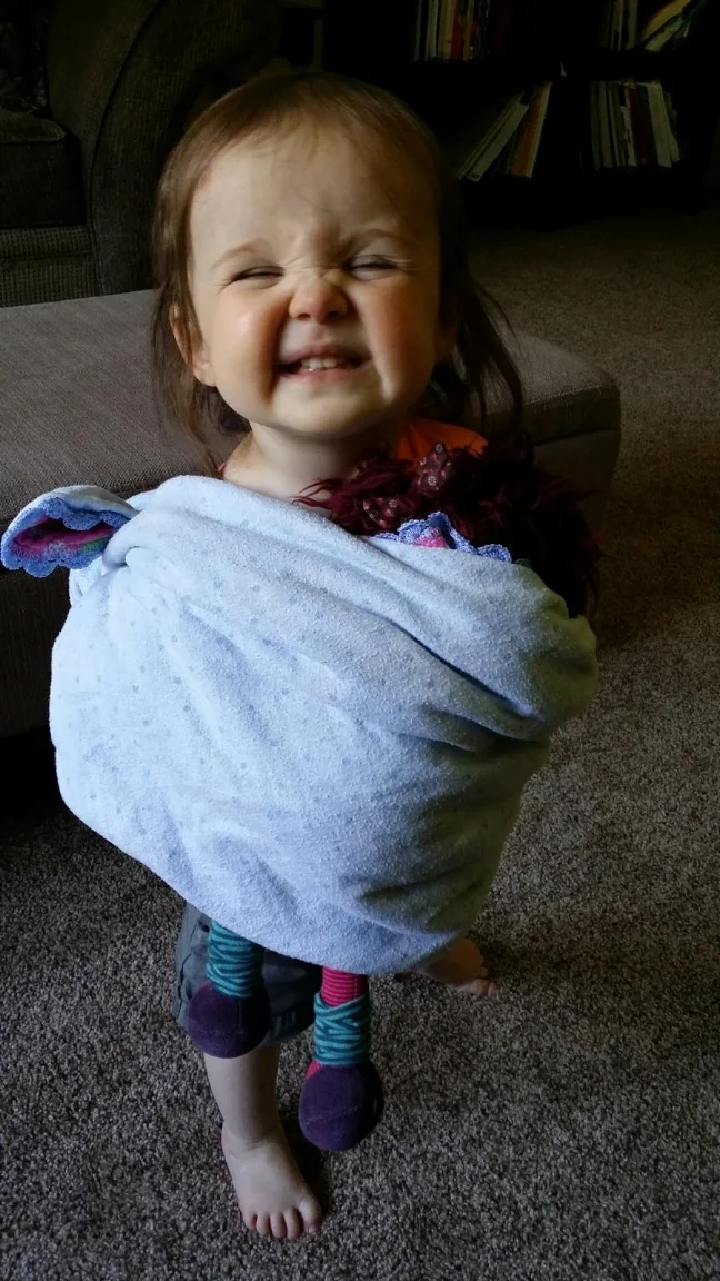 By the time Mimi was born, Wheezer was completely using the toilet. She was a mini-me (holding her Jeanne Doll in a wrap).