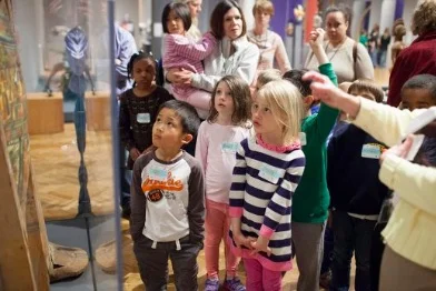 Children glass case MIA tour.jpg