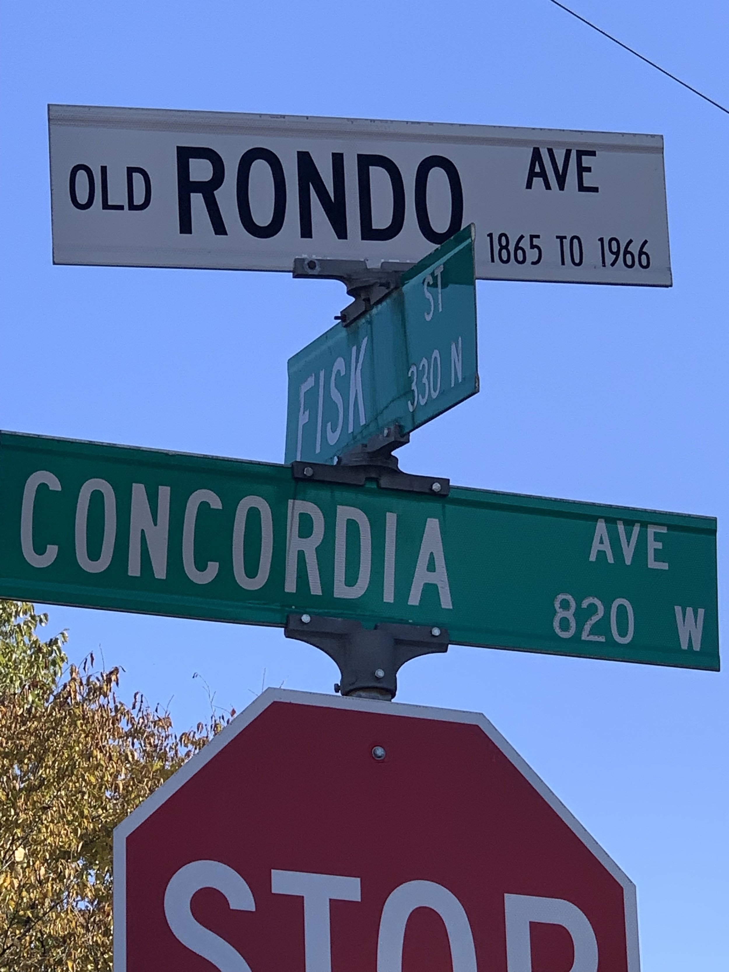 Rondo Sign with Fisk and Concordia and Stop blue skies.jpg