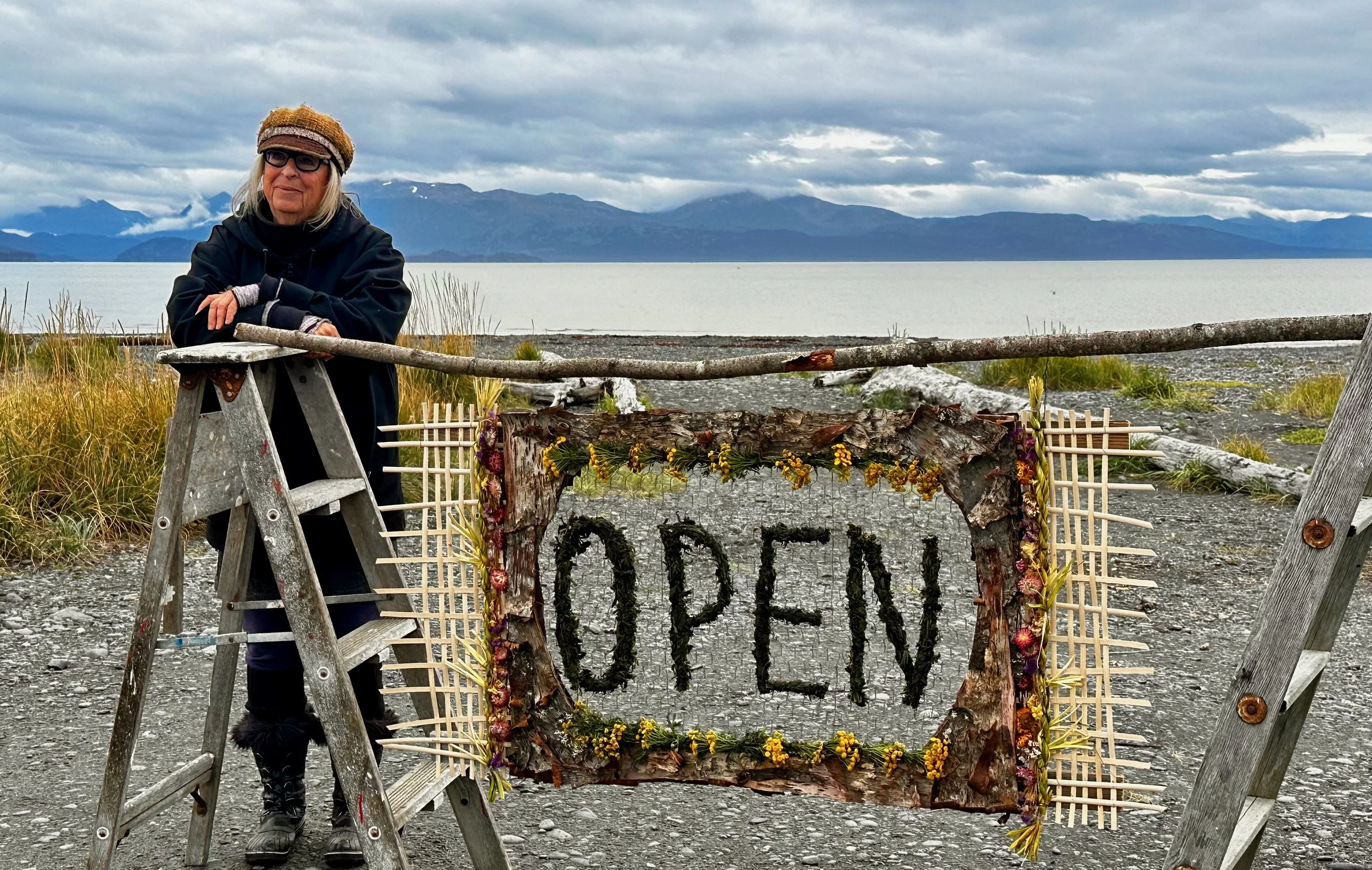 Mavis with Open Sign.jpeg