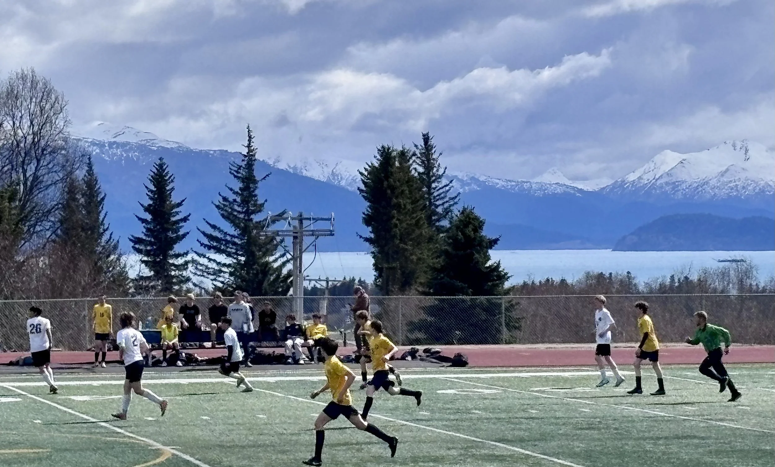 Homer Boy's Soccer on Mariner Field with Mountains.jpeg