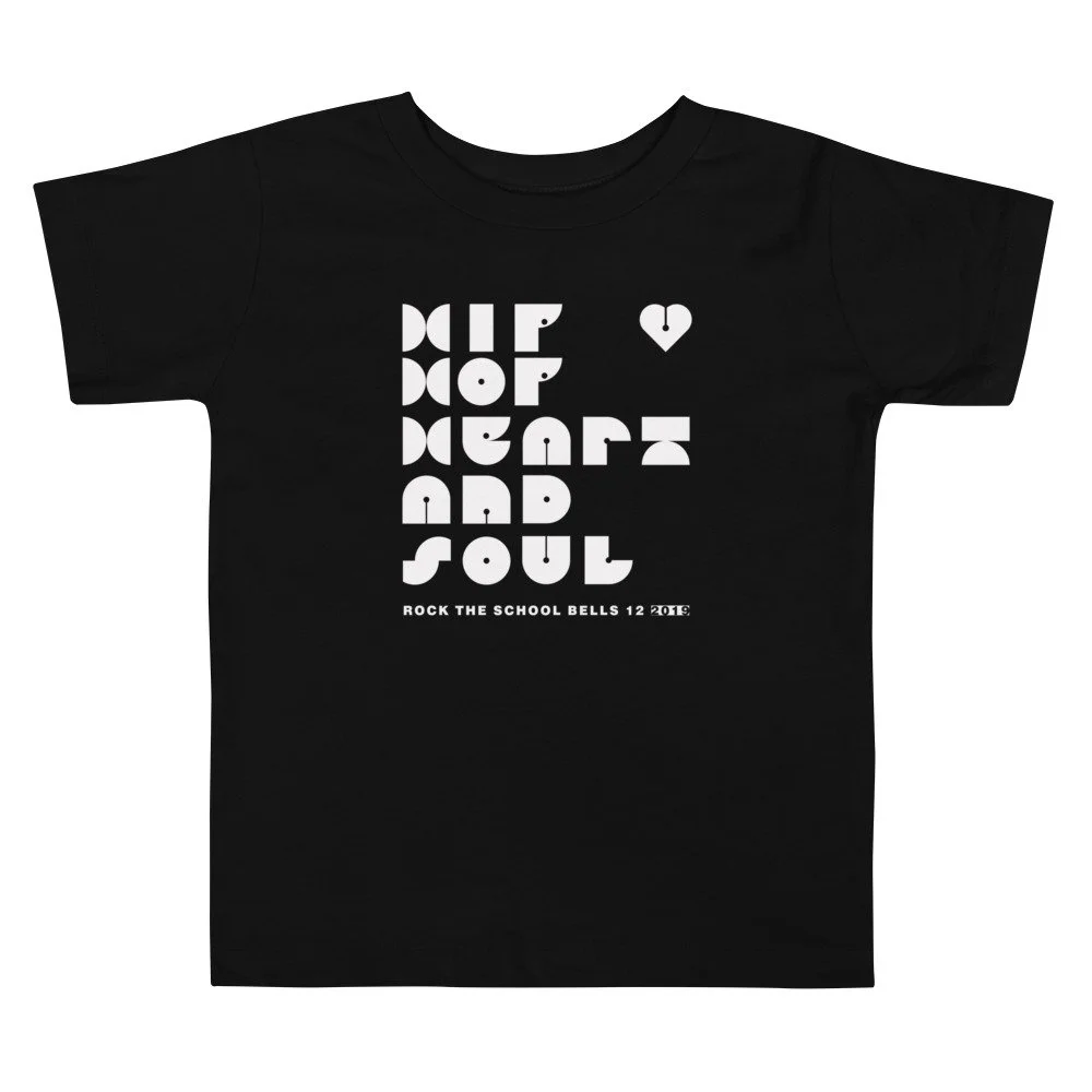 toddler-staple-tee-black-front-61b7055a4ed6e.jpg