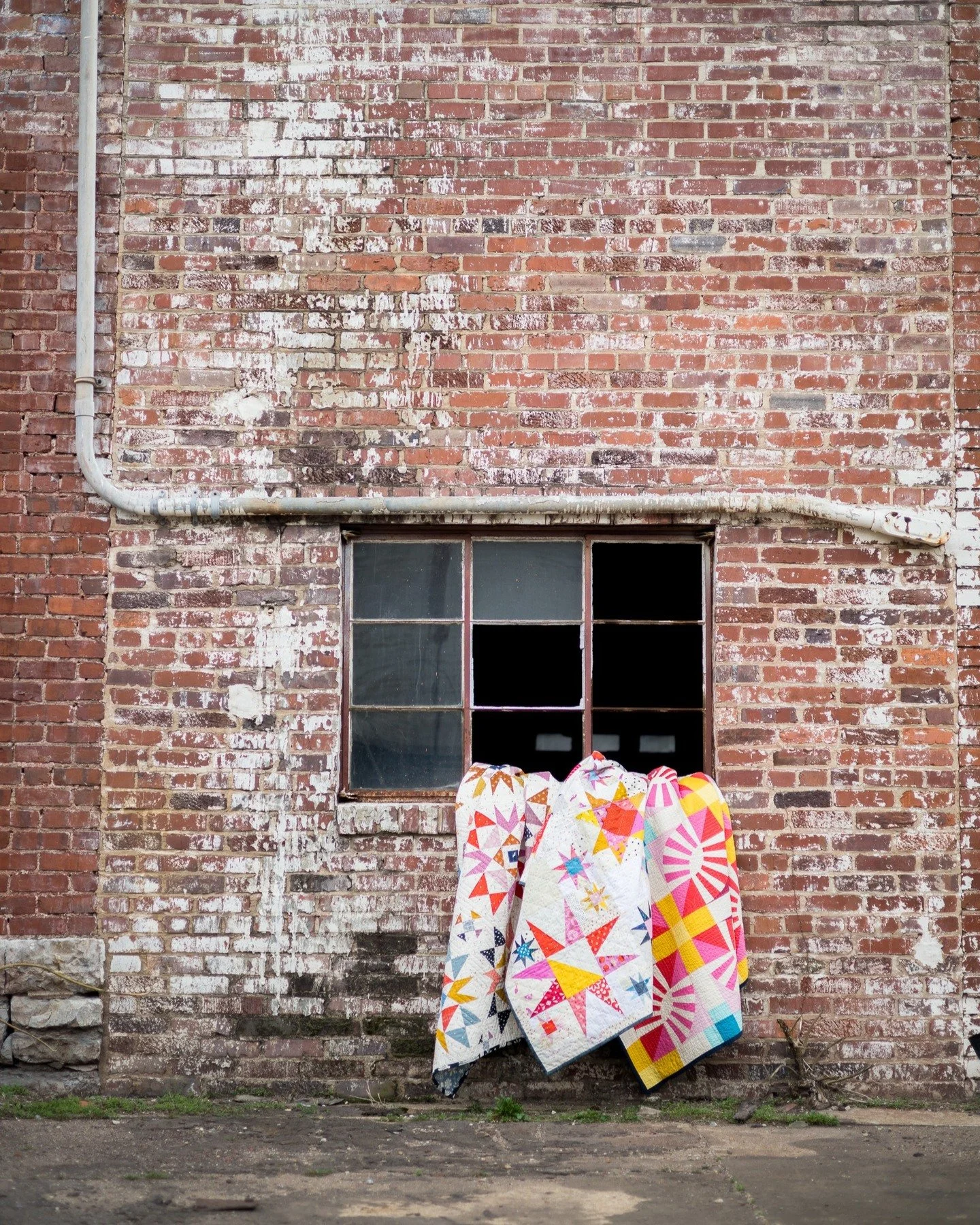 I really love that I'm a quilter. 

Last week we were on a video shoot and most of my co-workers really enjoyed the cool space, but I'm the only one who brought an armful of quilts the next day, stuck them in all sorts of unlikely places, and took ph