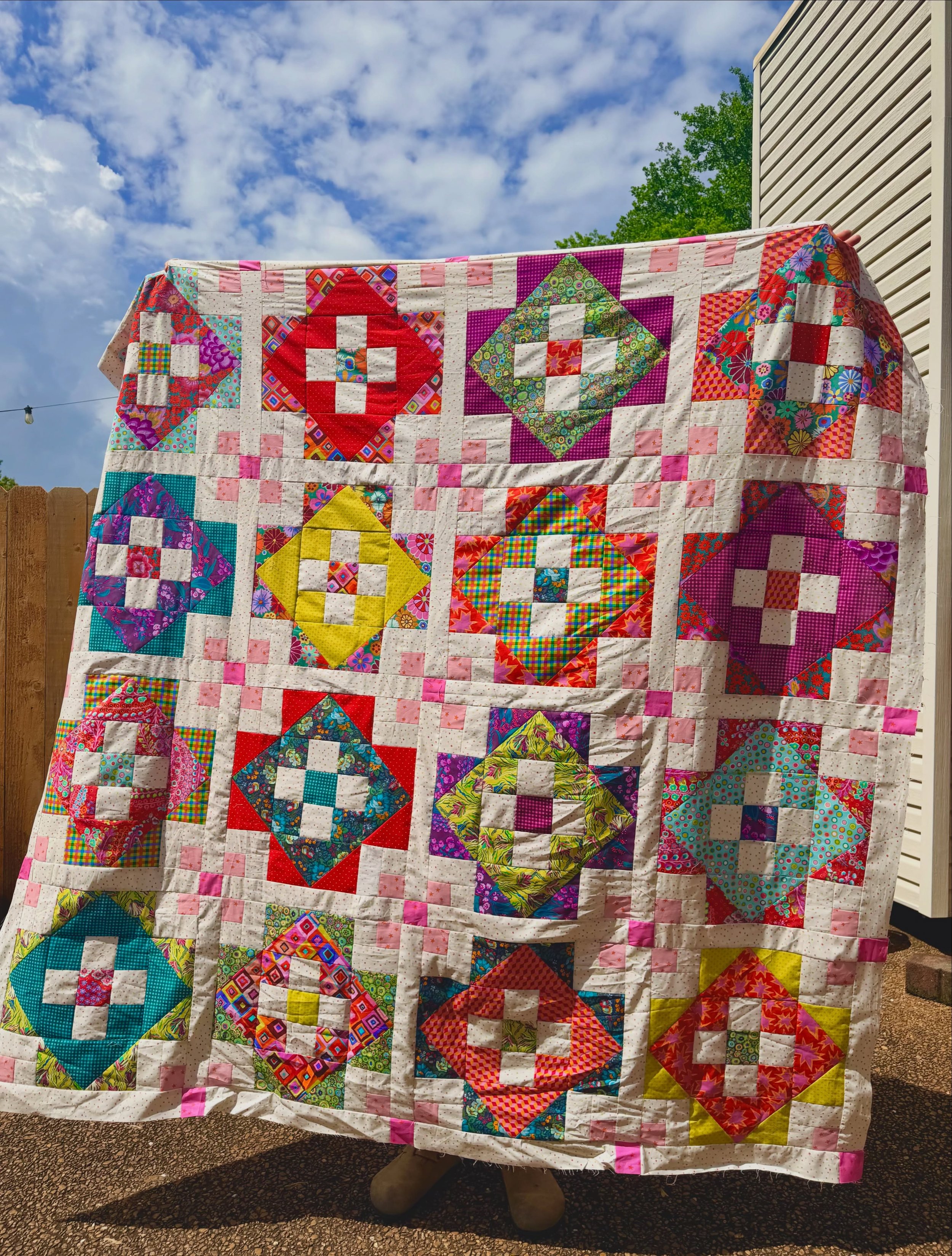 This one belongs to Adam&rsquo;s wife. 

Adam is a friend and former co-worker who got curious about quilting a while back. I can&rsquo;t take credit for teaching him anything &mdash; but I&rsquo;ve been around to answer questions and point him in th