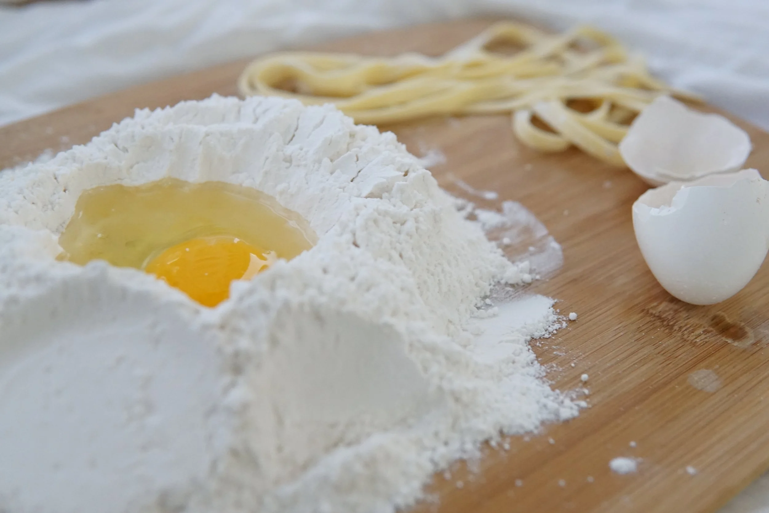 A co-occurrence of flour and egg implies a relationship between the two. Photo by Elle Hughes on Unsplash