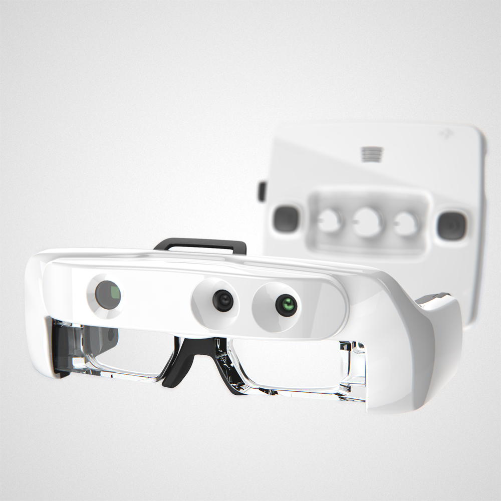 The Helios headset in glossy white from the front view, with the control box blurred in the background