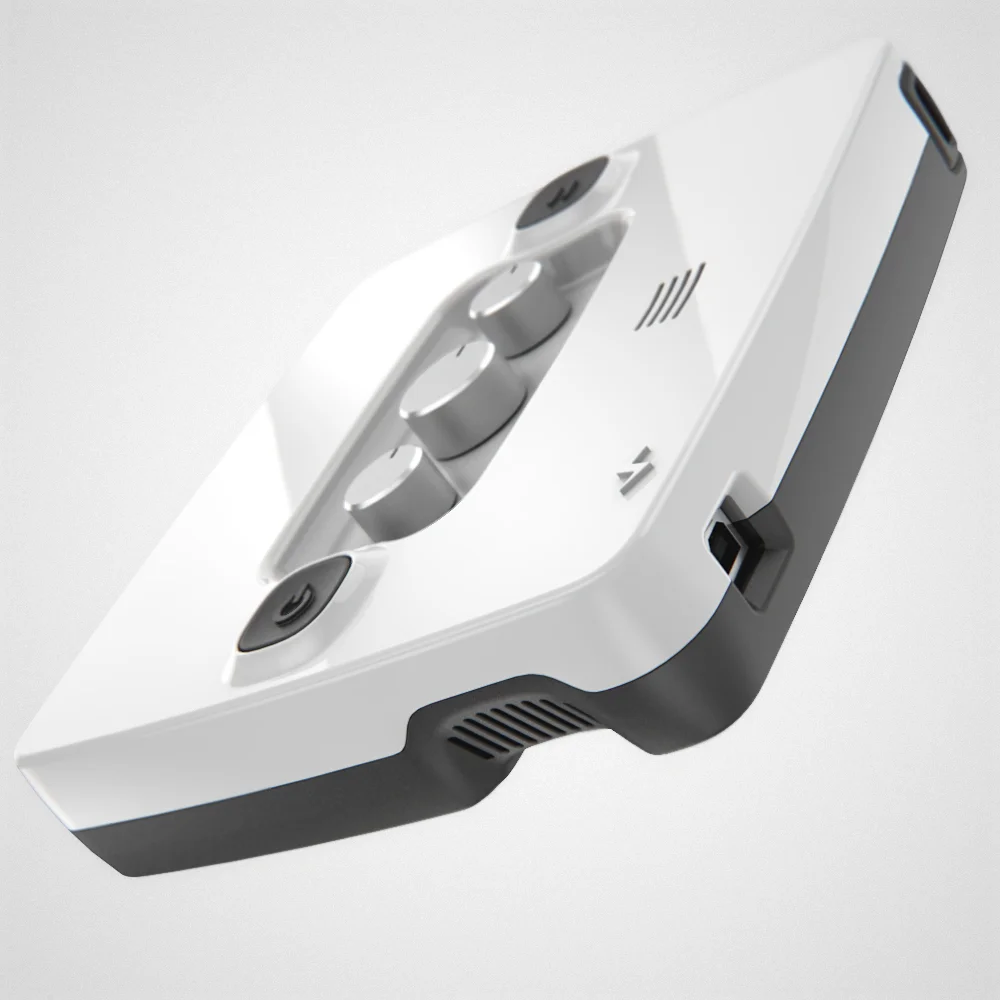 The glossy white control box with buttons and dials visible on the front face