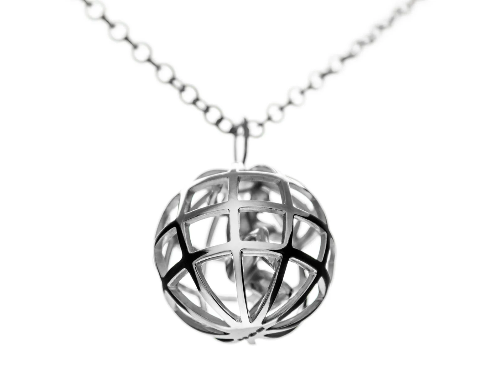 A stirling silver Atlas pending hanging from the silver chain