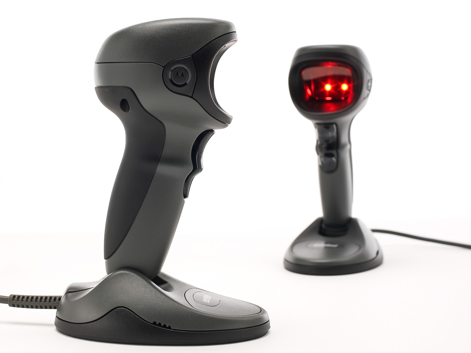 Two black DS9808s on a white surface; one showing the side view and one is showing the front view and an illuminated front window in red