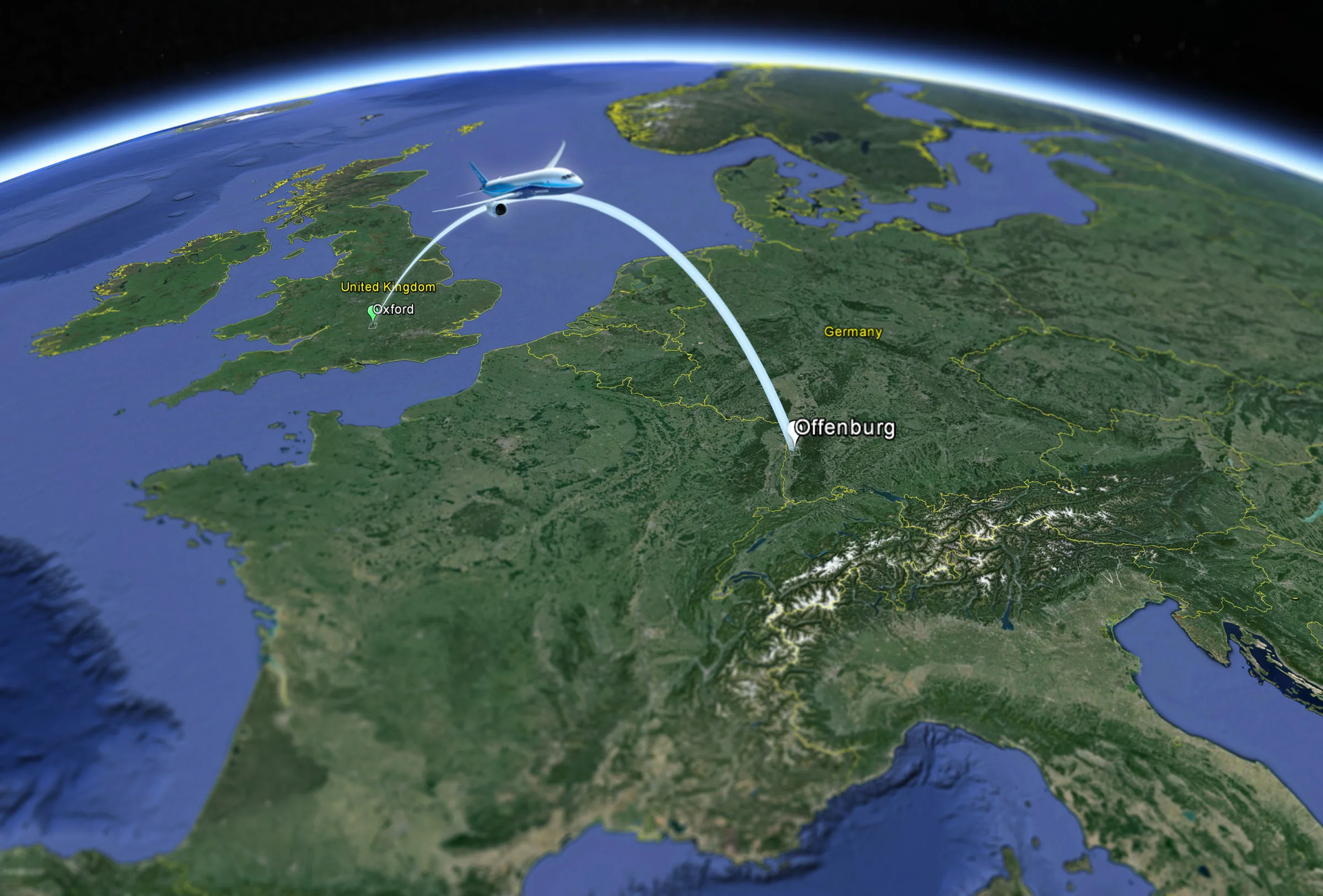 A plane flying an imaginary path from Oxford UK to Offenburg, Germany over a globe view of Earth
