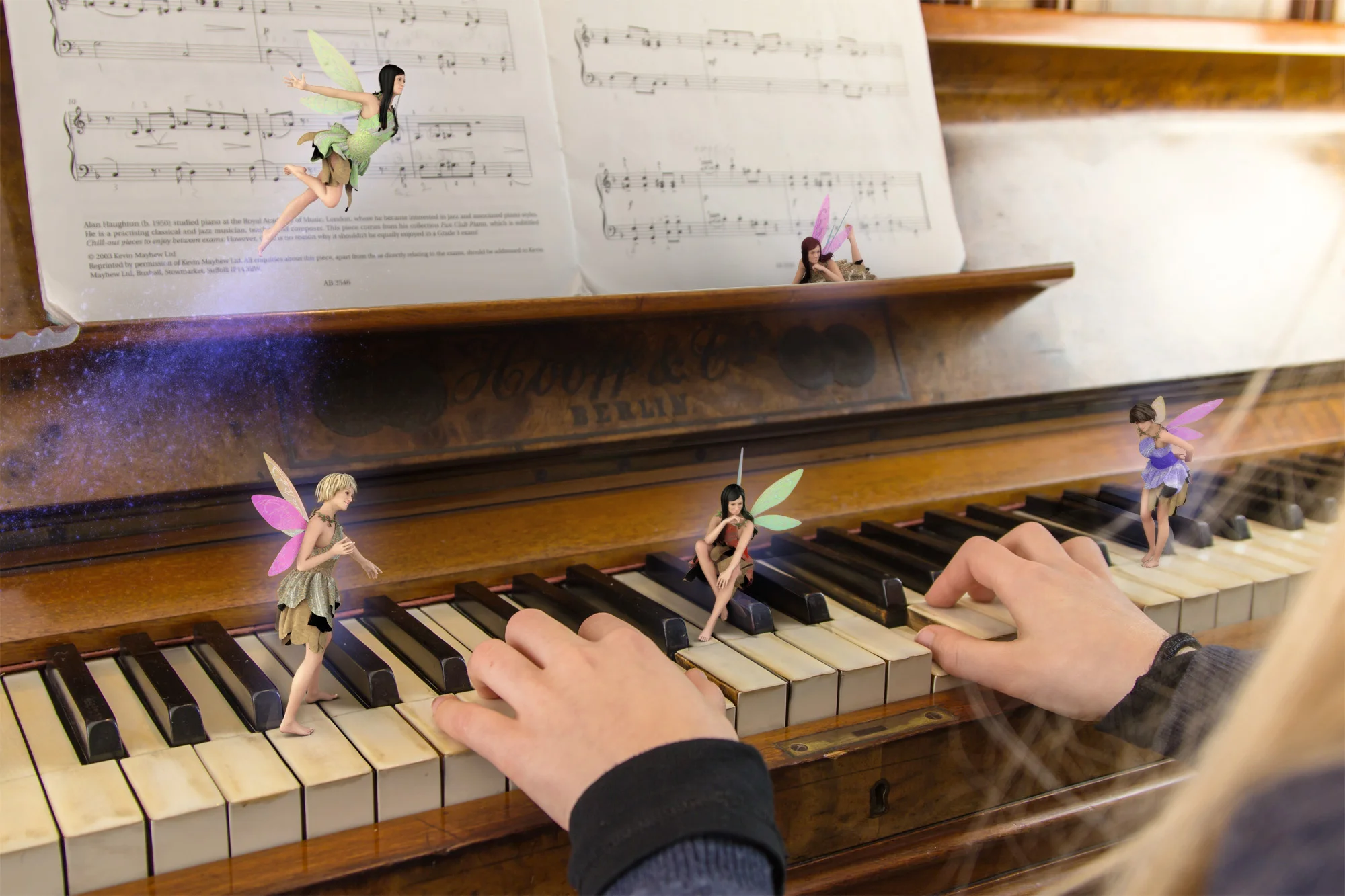 5 fairies dancing around a young girls hand while she learns how to play piano with their guidance