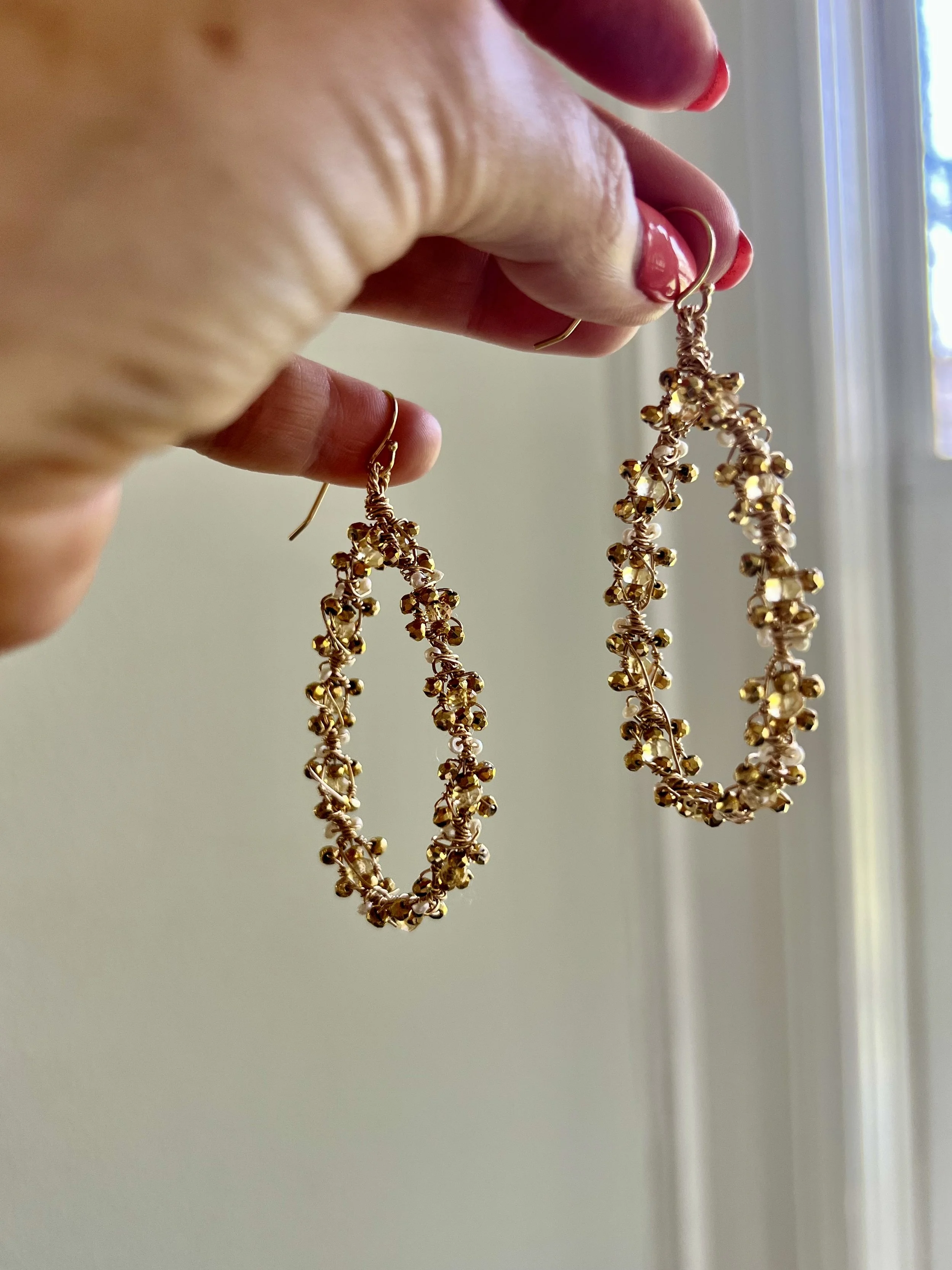 Textured, side facing elongated hoop in gold and citrine