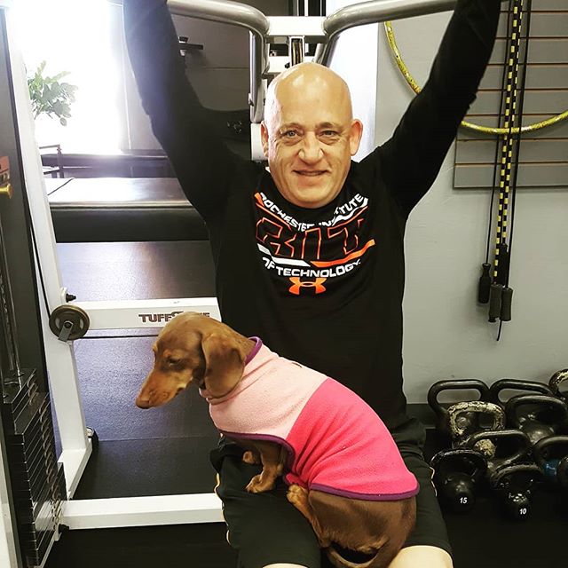 Friday's are for doing shoulder presses and holding weiner dogs...didn't you know that??? Life is ruff... #gymlife #miniwiener #minidachshund #rufflife #fitfam #fitness #fitnessmotivation #ignite #ignitefitness #gethot