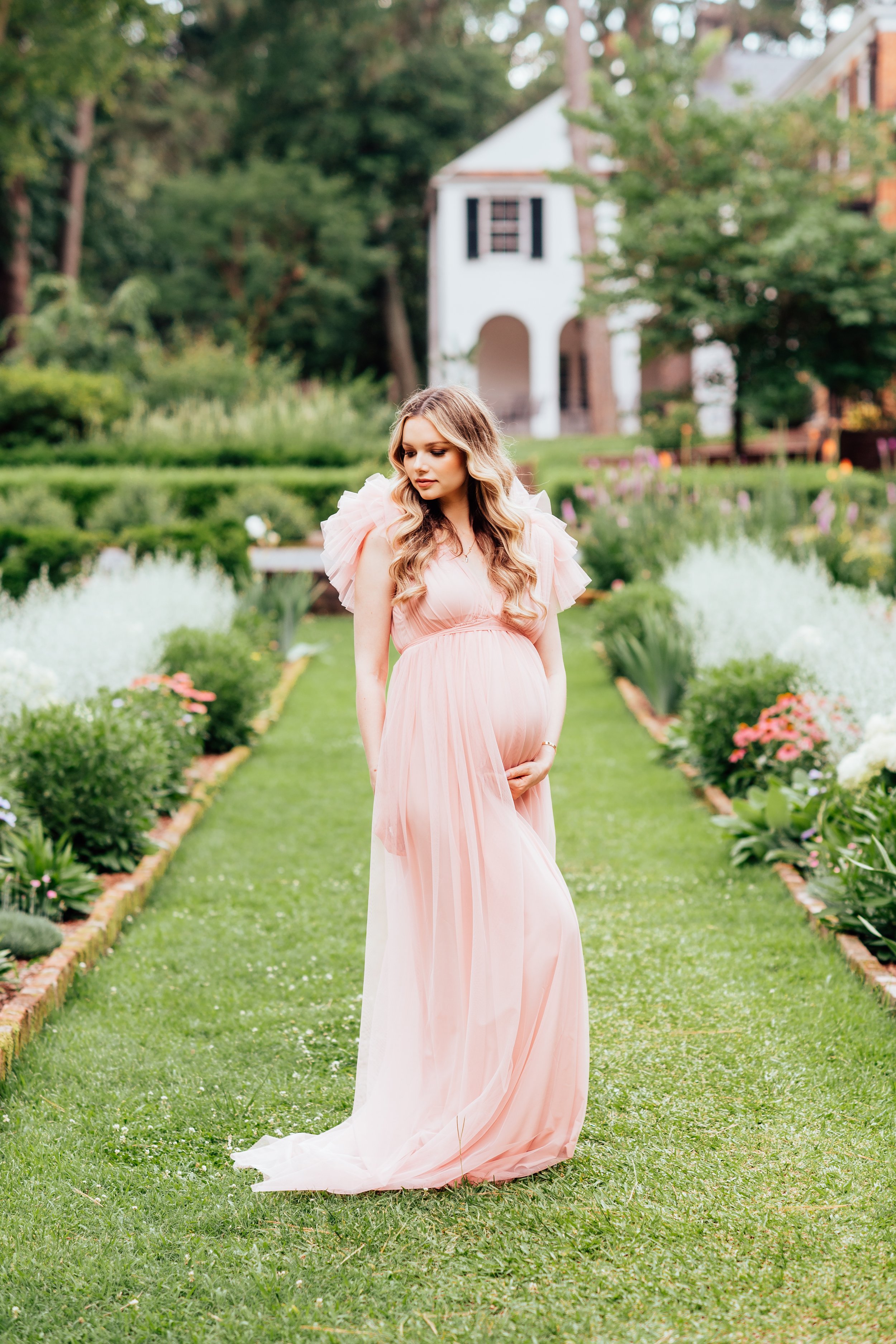 Pregnant woman in pink gown