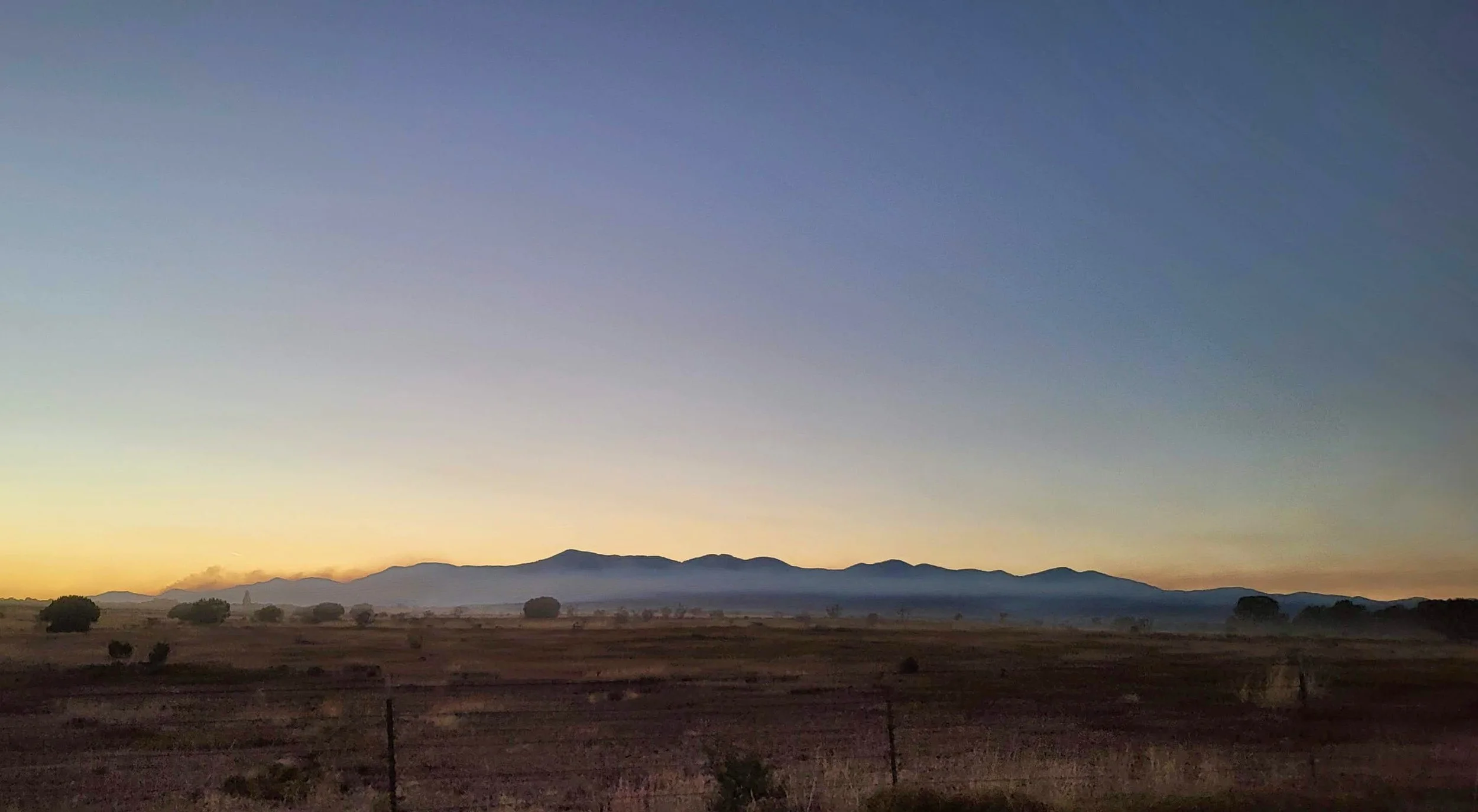  Smoke drifting from the burn area north across the Manzano Mountains after ignitions were completed. 