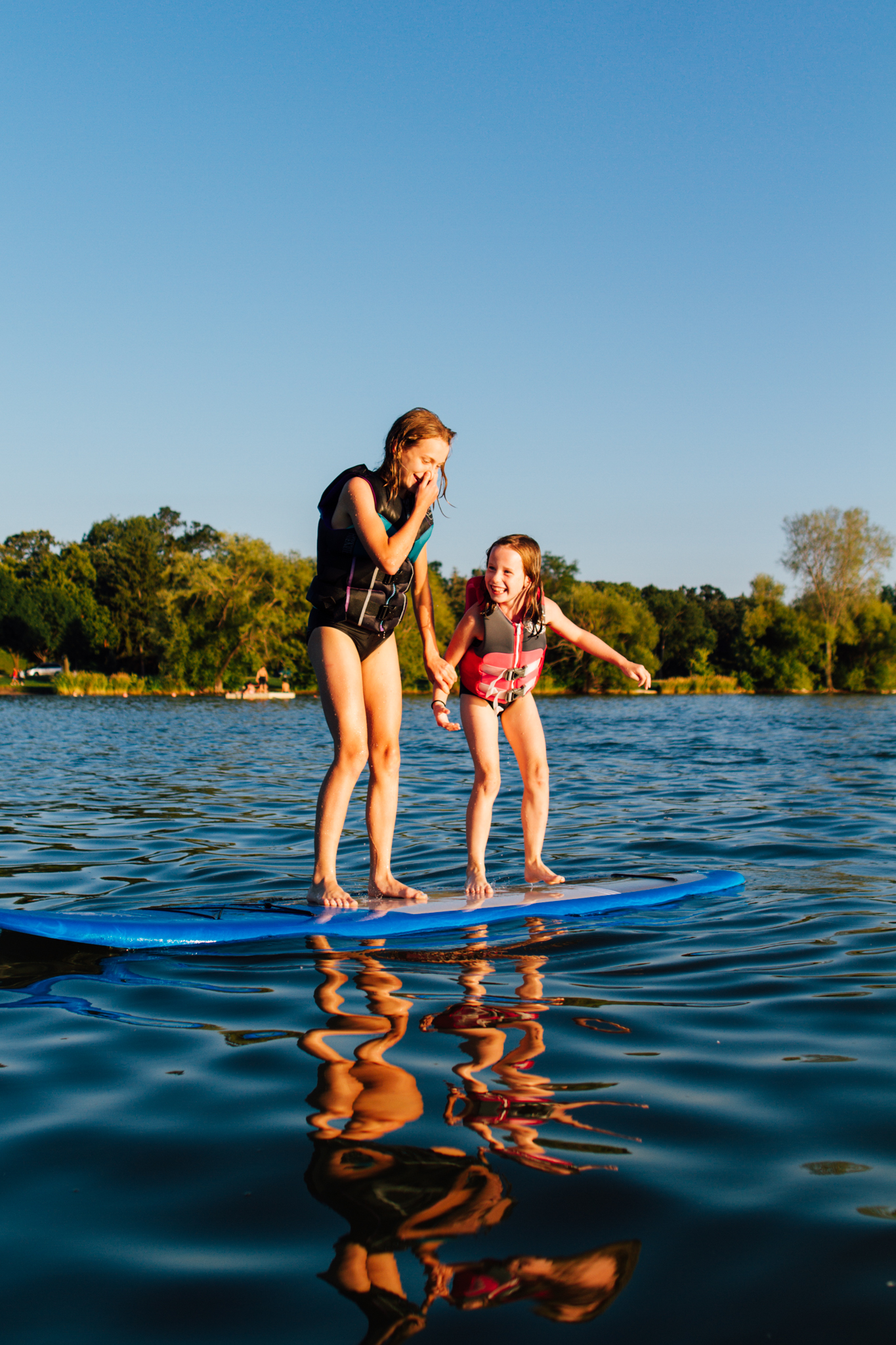 Lake Washington paddleboarding family portrait photography