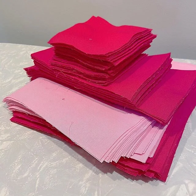 Piles of pink squares for the #vintagelaceqal by #loandbeholdpatterns