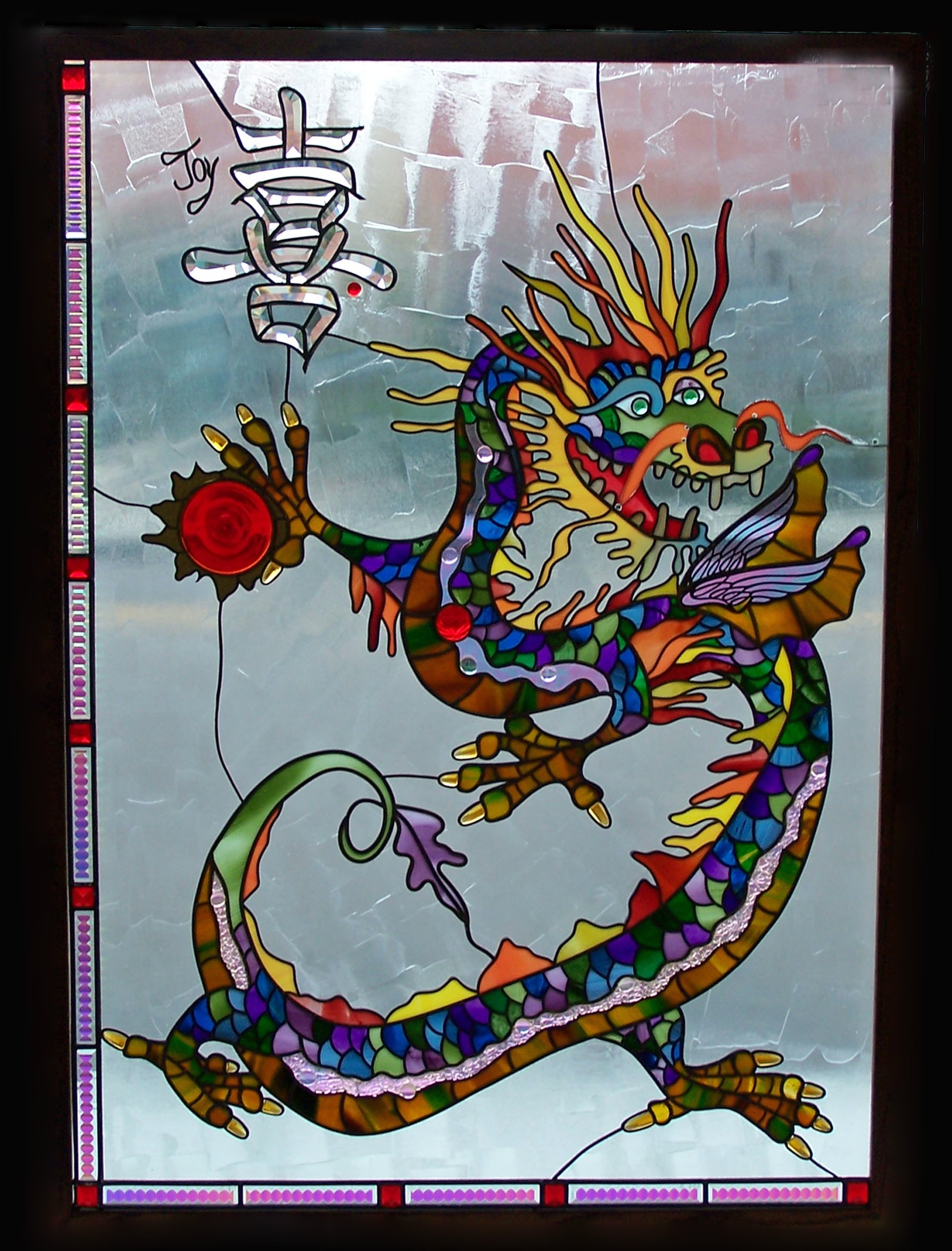  An award winning design, this four-toed dragon is a symbol of protection along with the Chinese character for ‘Joy’. It is framed and hung in a Vista home. 