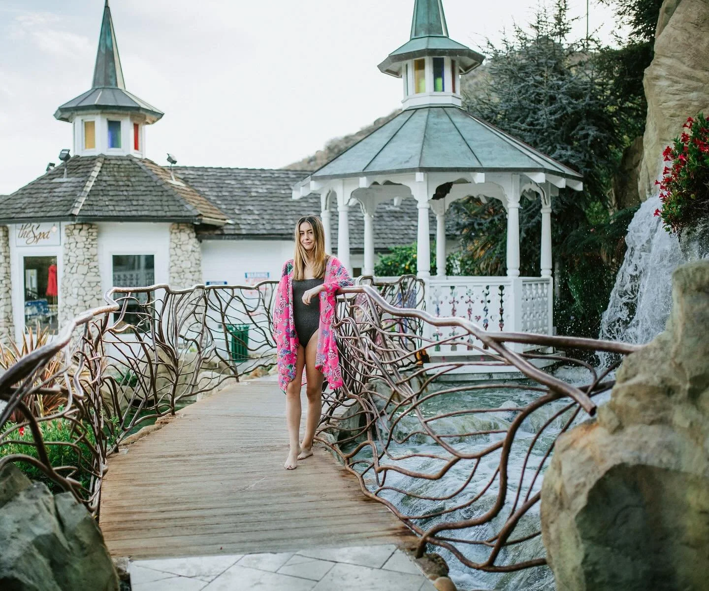 The dreamiest vacation spot ✨ where else can you find a pool, waterfall, spa, and magical bridge all in one? Not to mention, this beautiful carpet print scarf used as a cover up, perfectly pulling the whole look together 💖