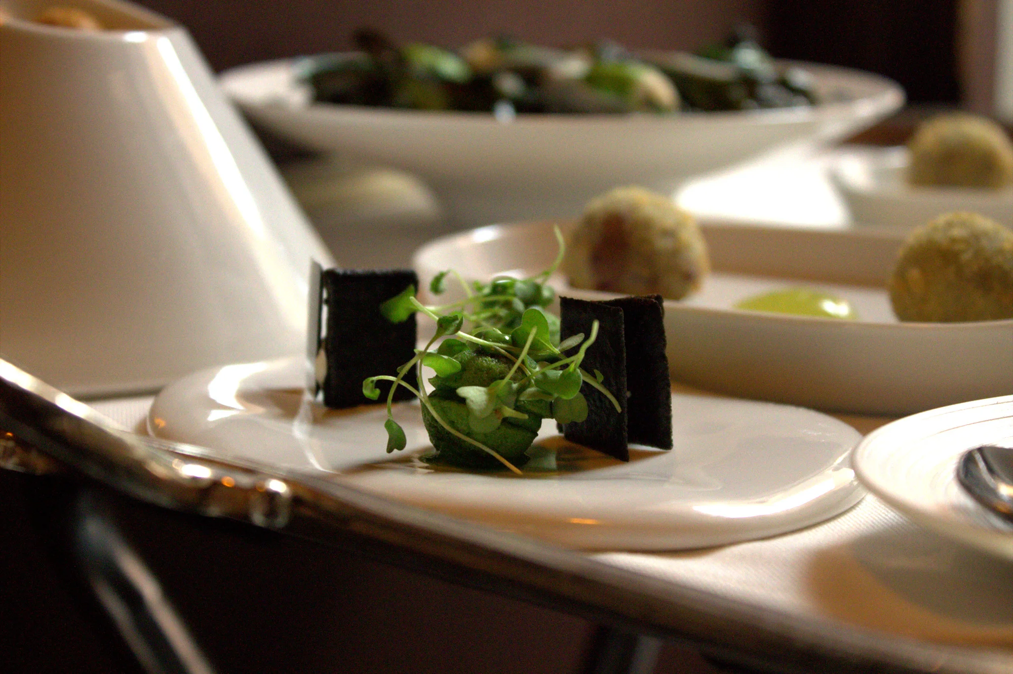 Roquette financiers with squid ink wafers