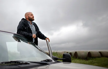 Michael standing outside truck.jpg