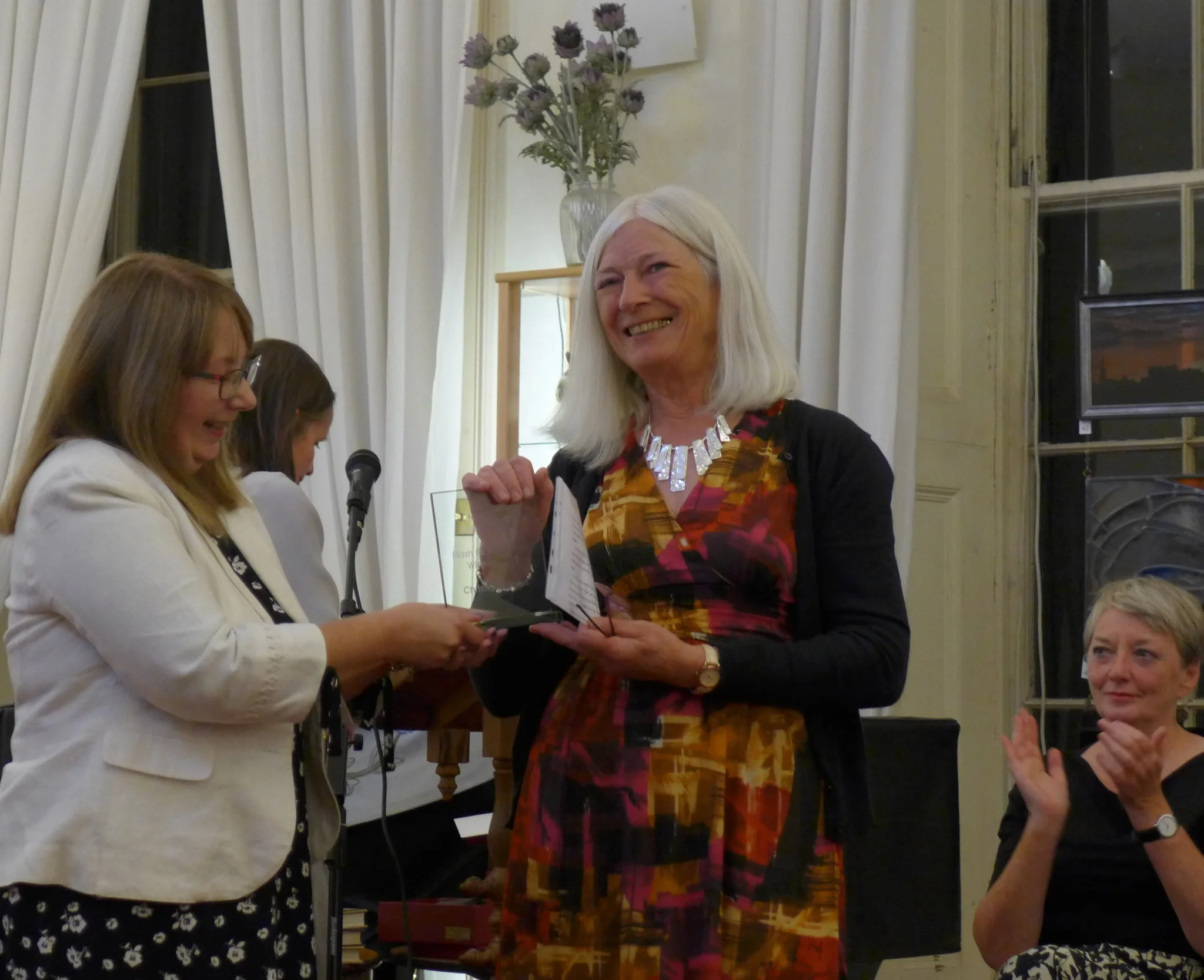 Christina read/performed her story ‘Full Circle’ and received her trophy and £500 award from Edinburgh International Flash Fiction judge Sandra Ireland .